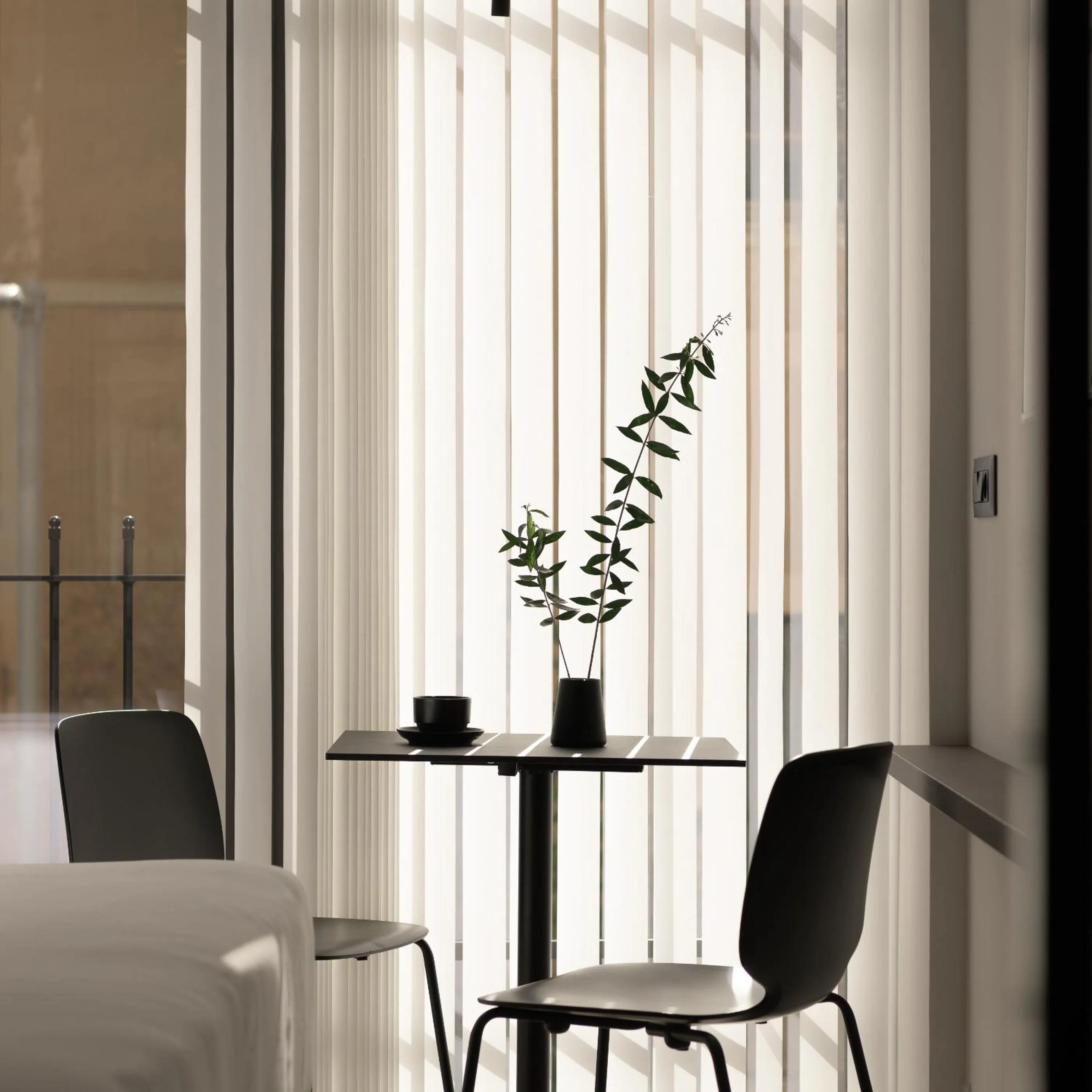 Seating area in Pleiades Urban Stay by Semavί