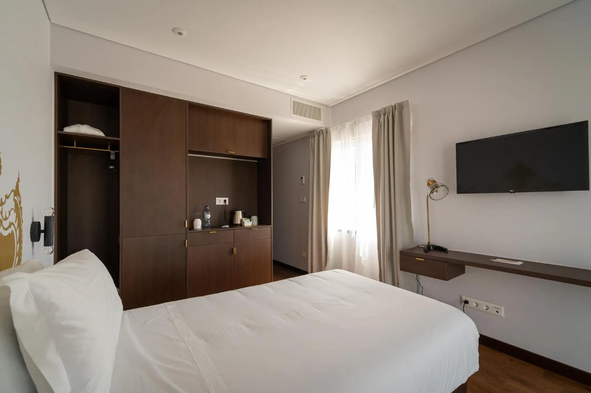 Bed in Palacio Santa Catarina Hotel