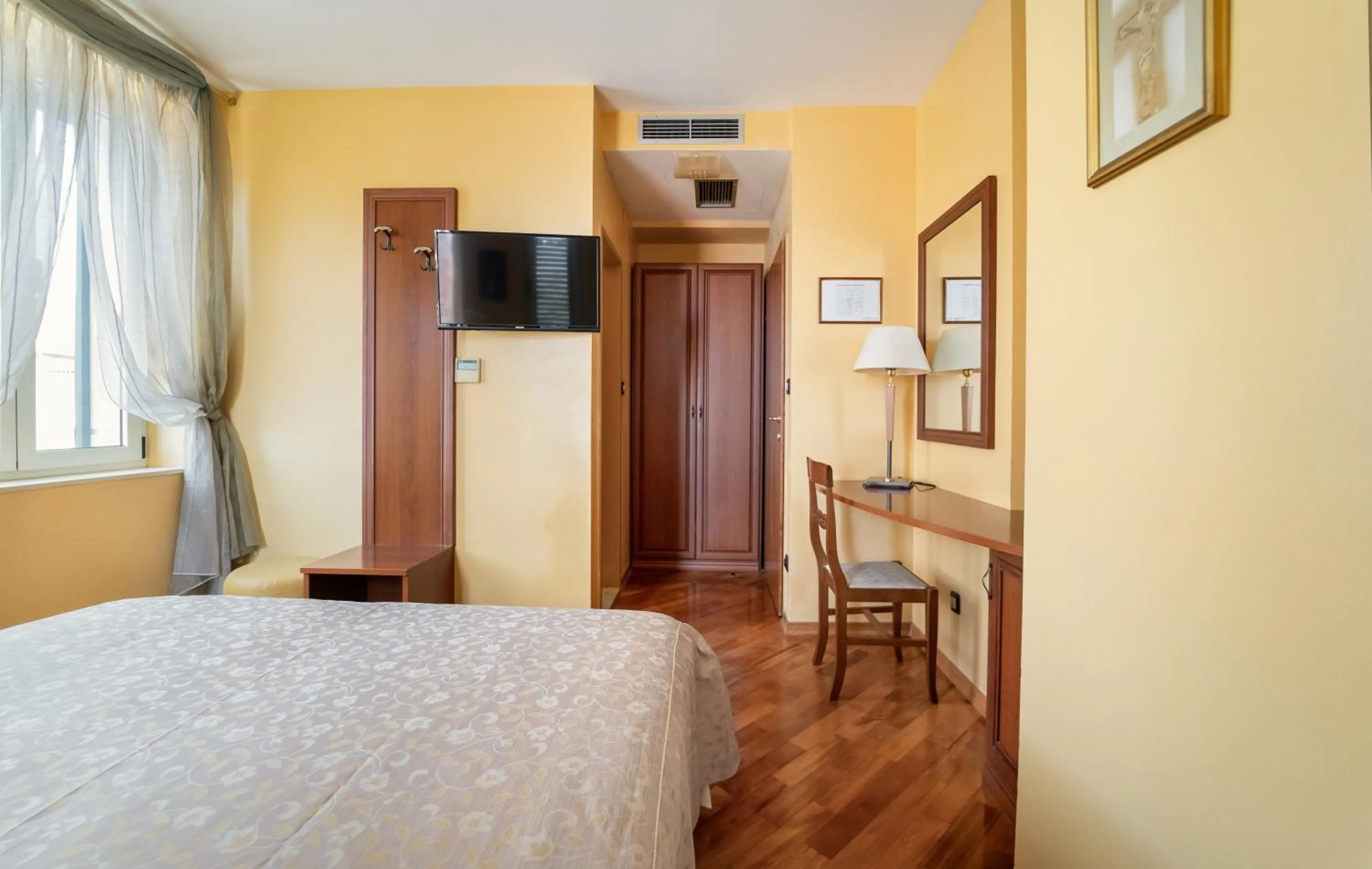 Bed in Hotel Peristil