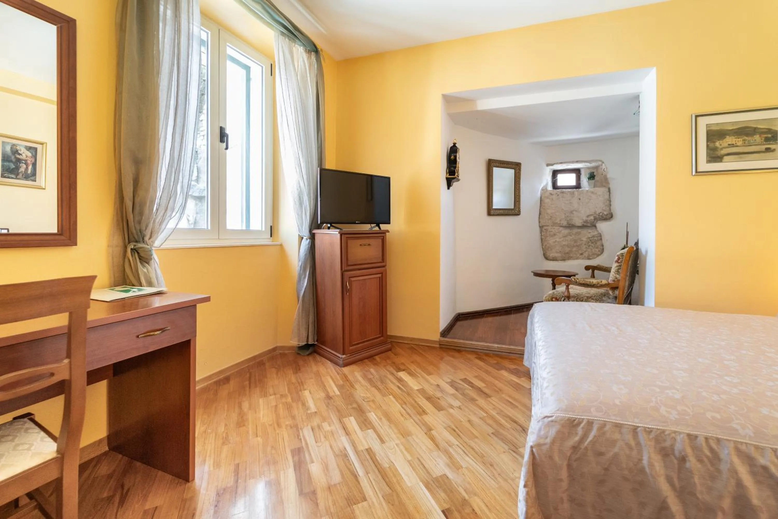 Bed in Hotel Peristil