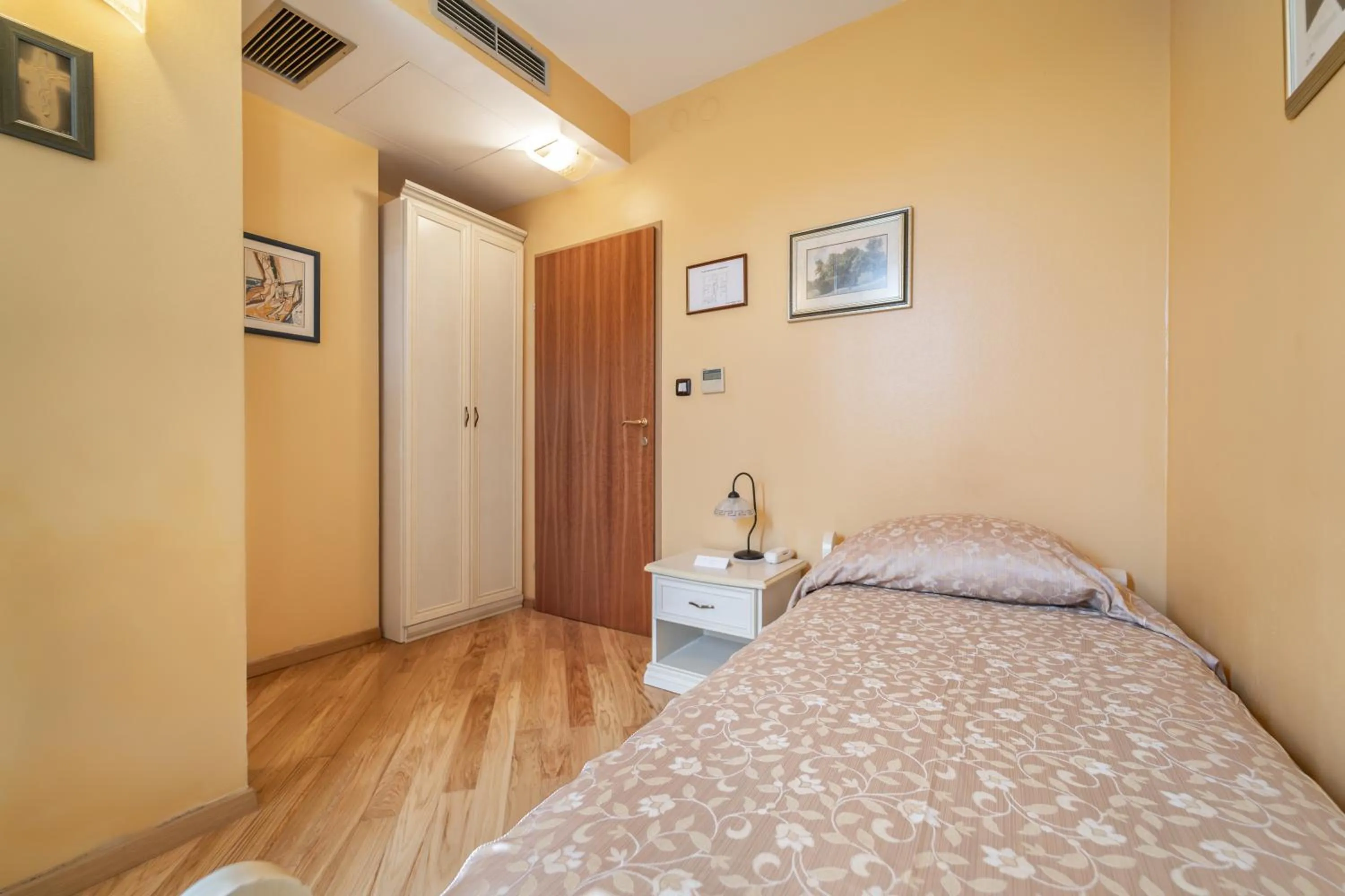 Bed in Hotel Peristil