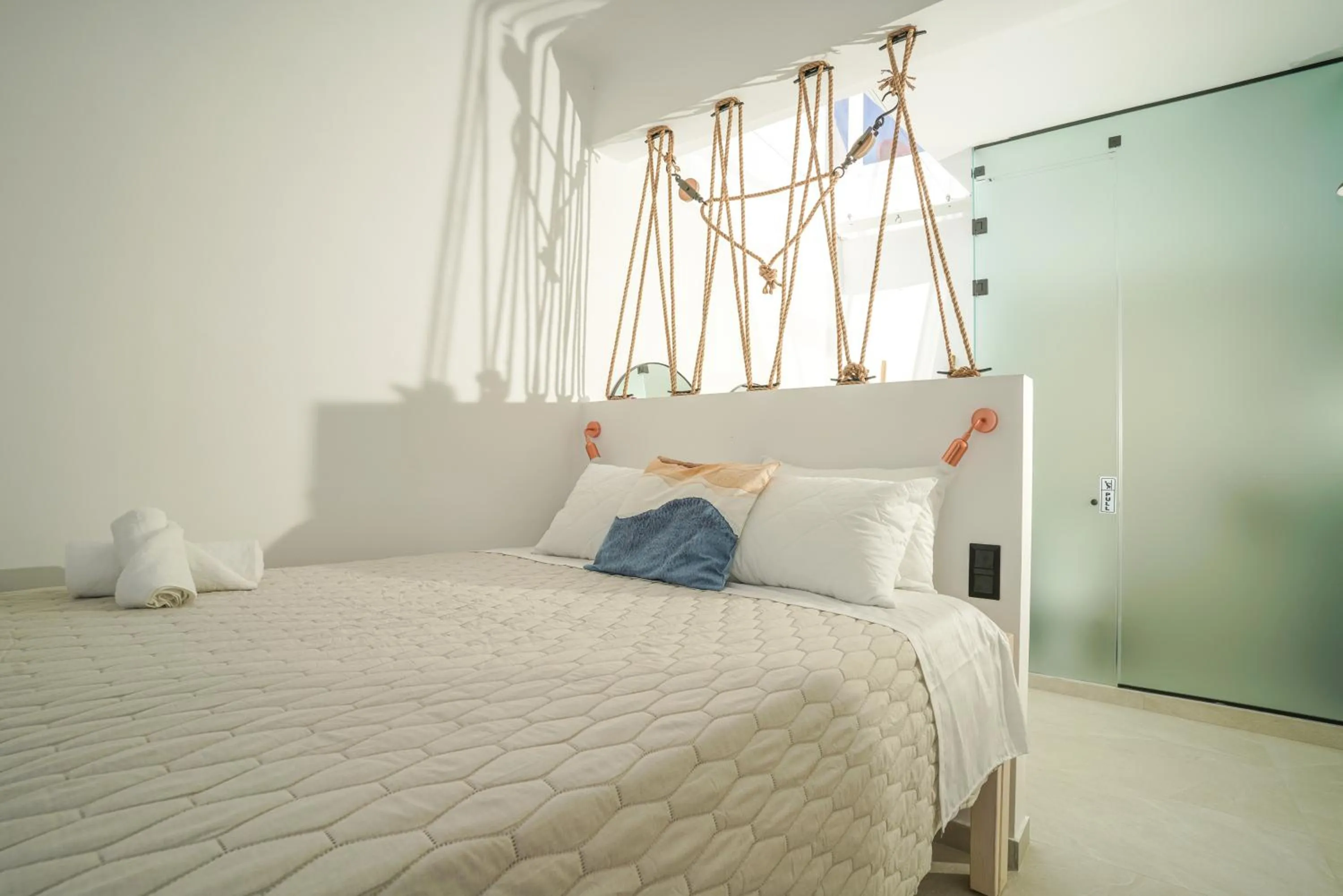 Bed in Seabed Suites Mykonos