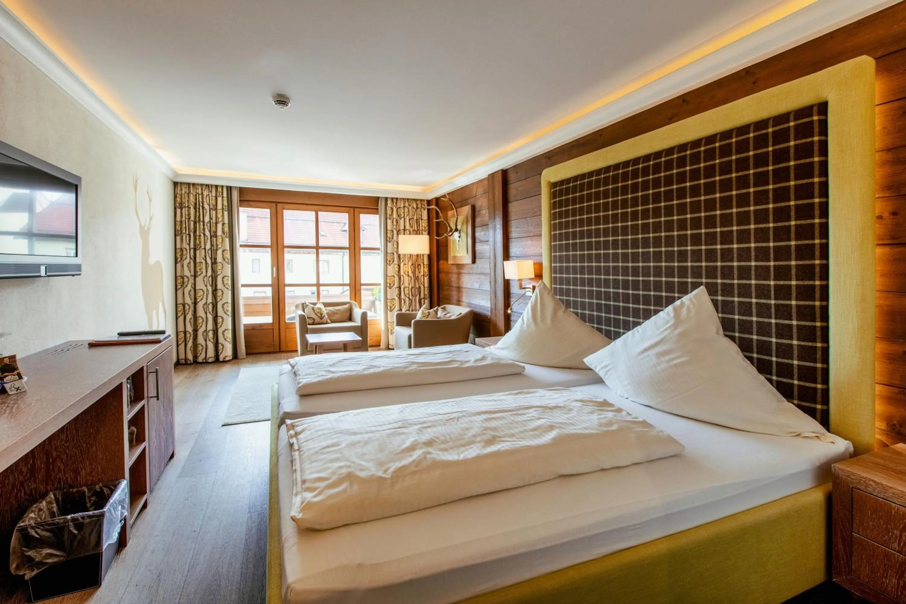 Photo of the whole room, Bed in Hotel Gasthof Alte Post Holzkirchen