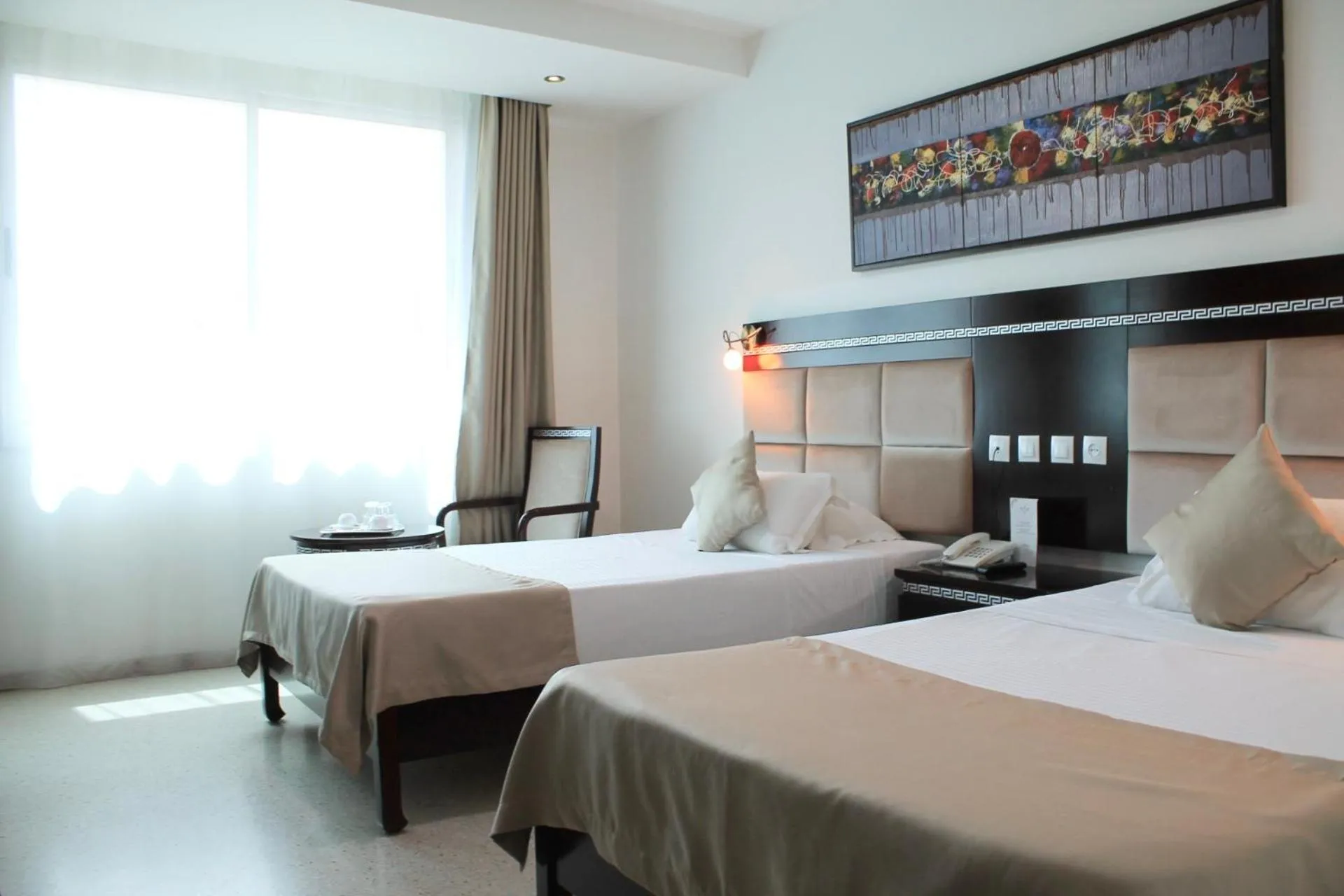 Bed in PALACE APPART HOTEL