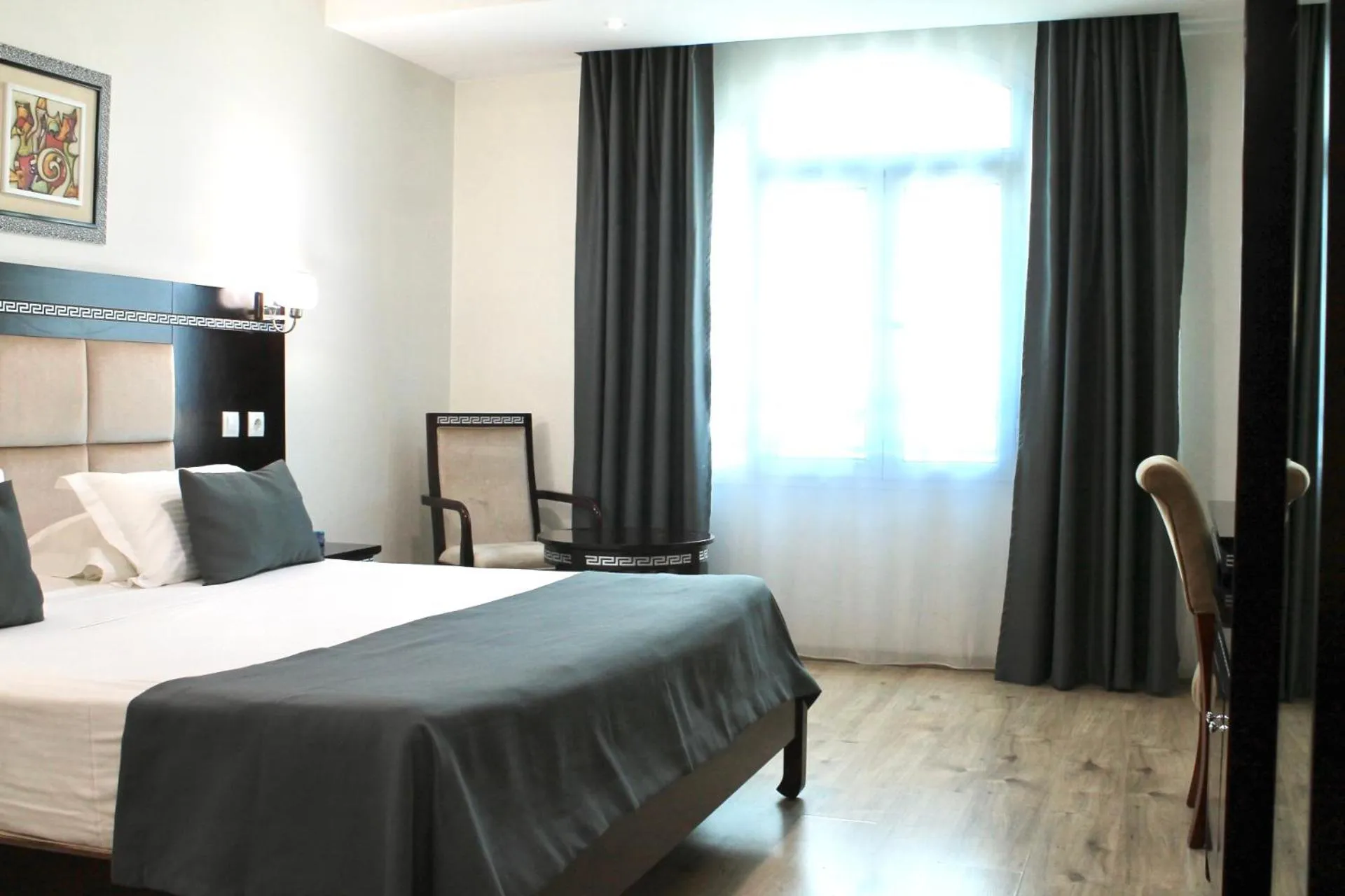 Bed in PALACE APPART HOTEL