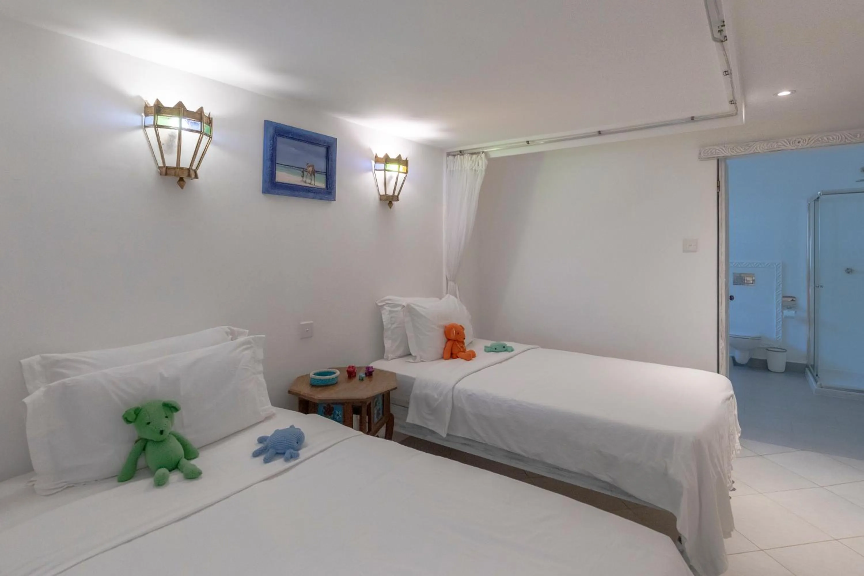 Bed in Nomad Beach Resort