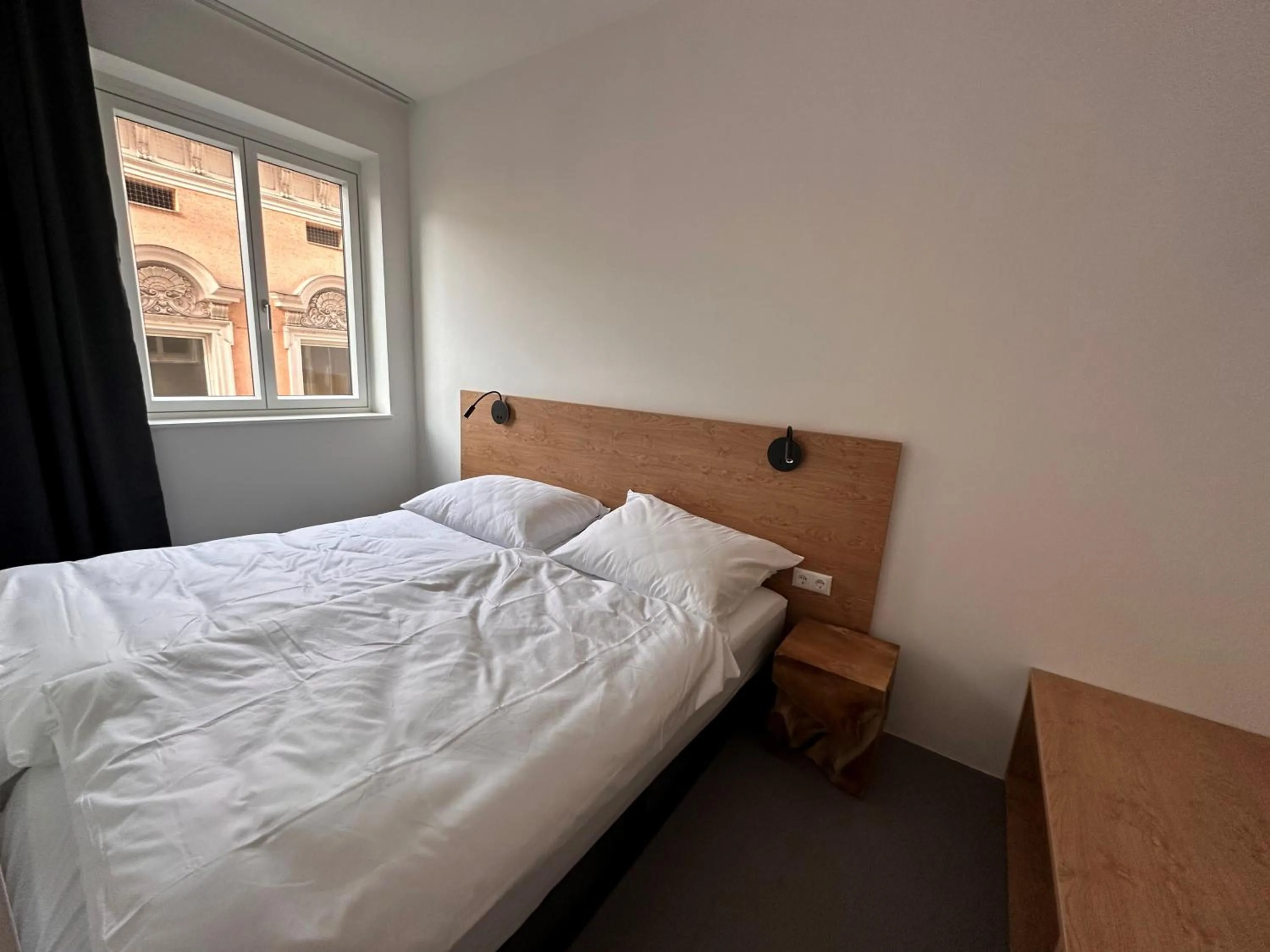 Bed in Rilke Apartments