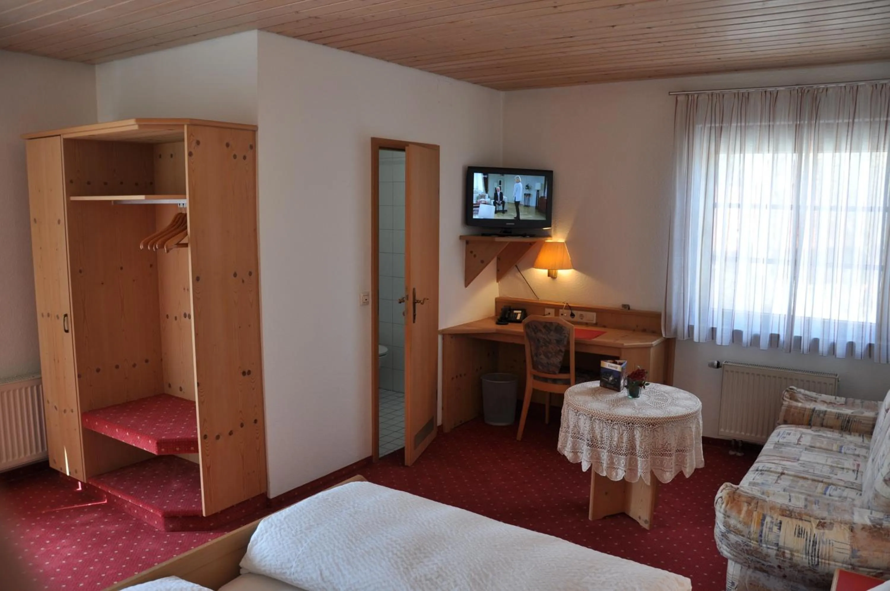 Photo of the whole room, Bed in Löwen Hotel & Restaurant