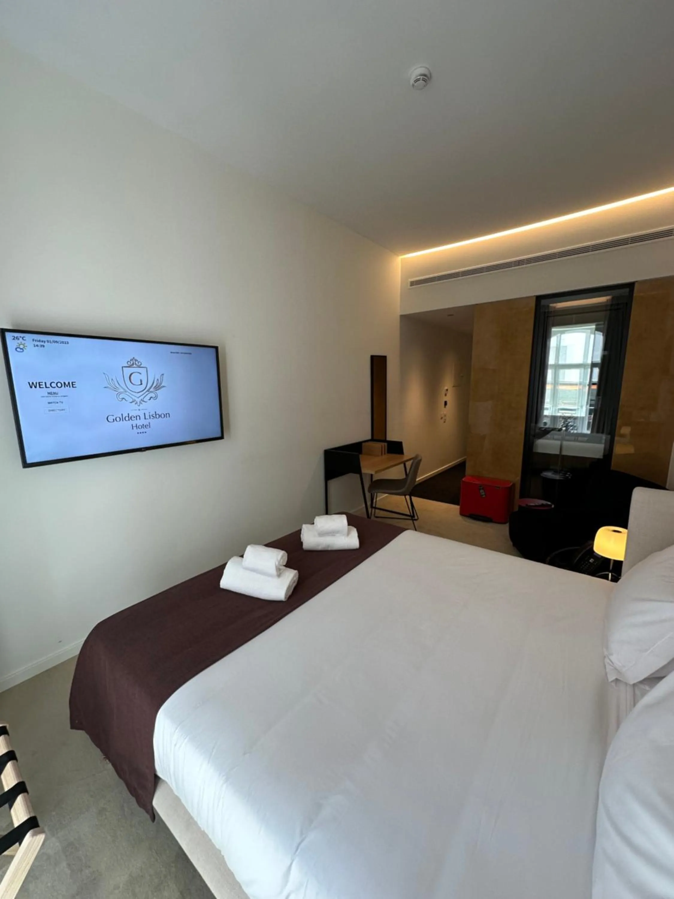 Bed in Golden Lisbon Hotel