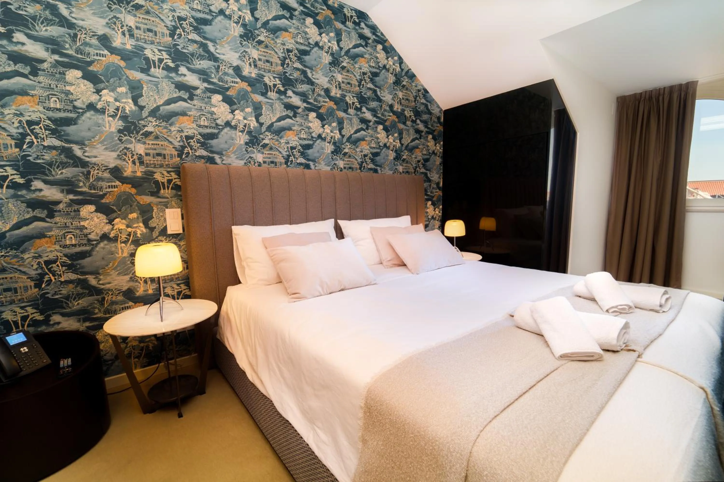 Bed in Golden Lisbon Hotel