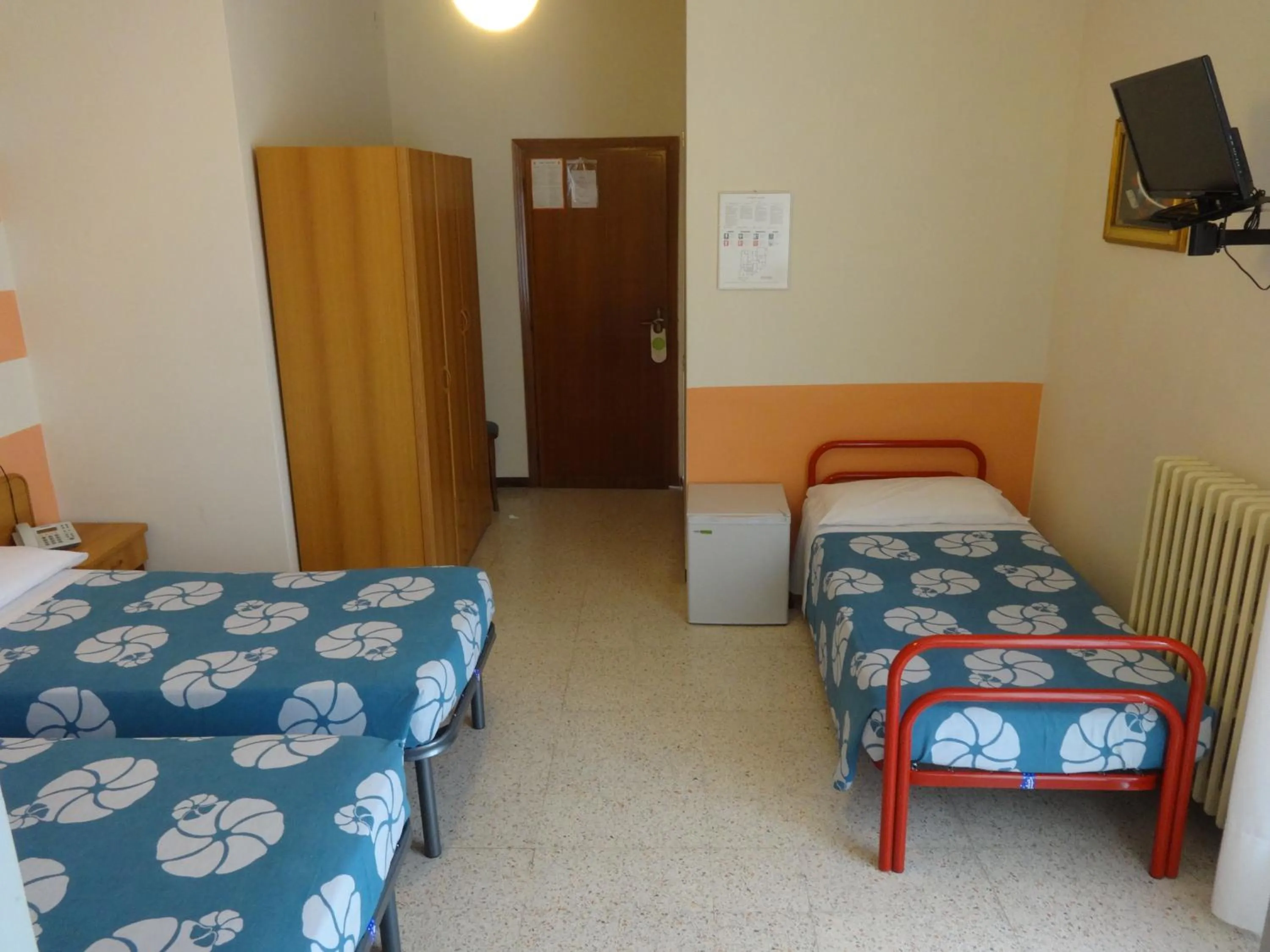 Bed in Hotel Saturno