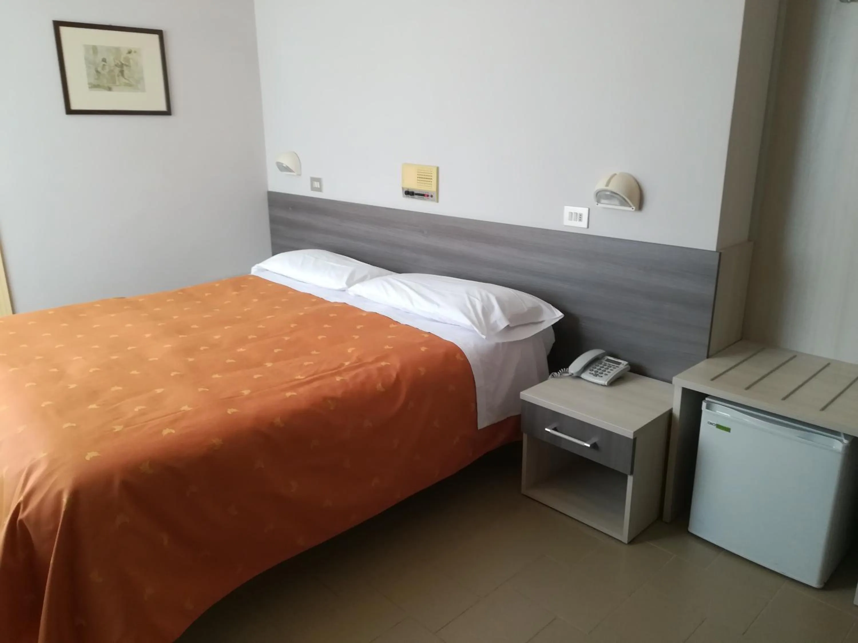 Bedroom in Hotel Saturno