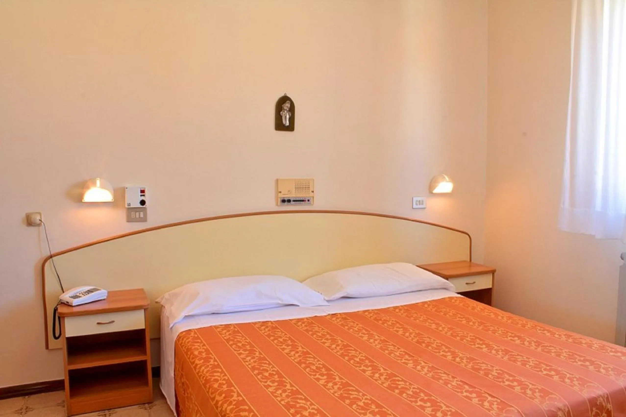 Bedroom in Hotel Saturno