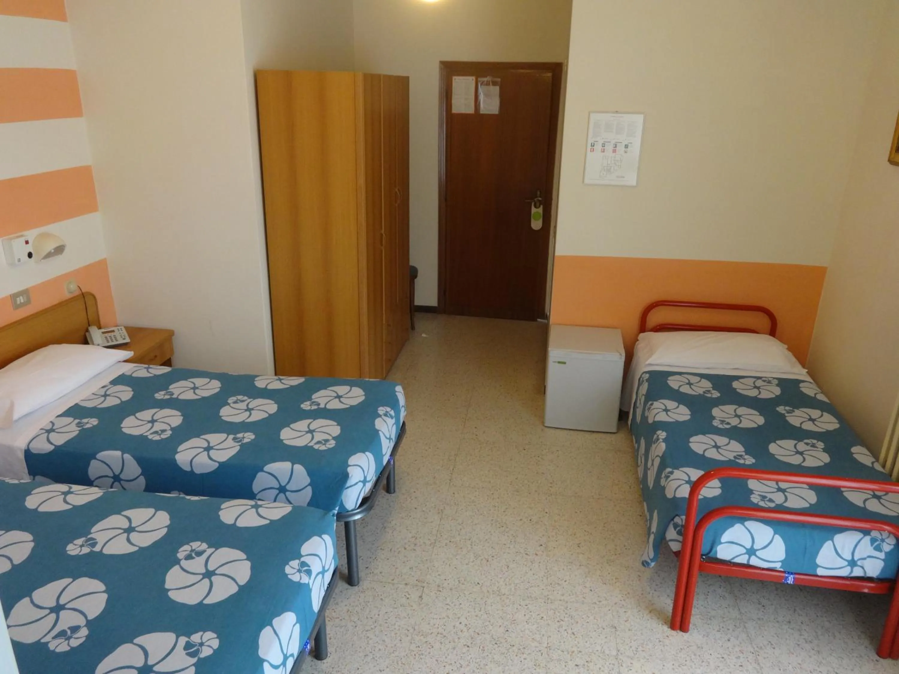 Bed in Hotel Saturno