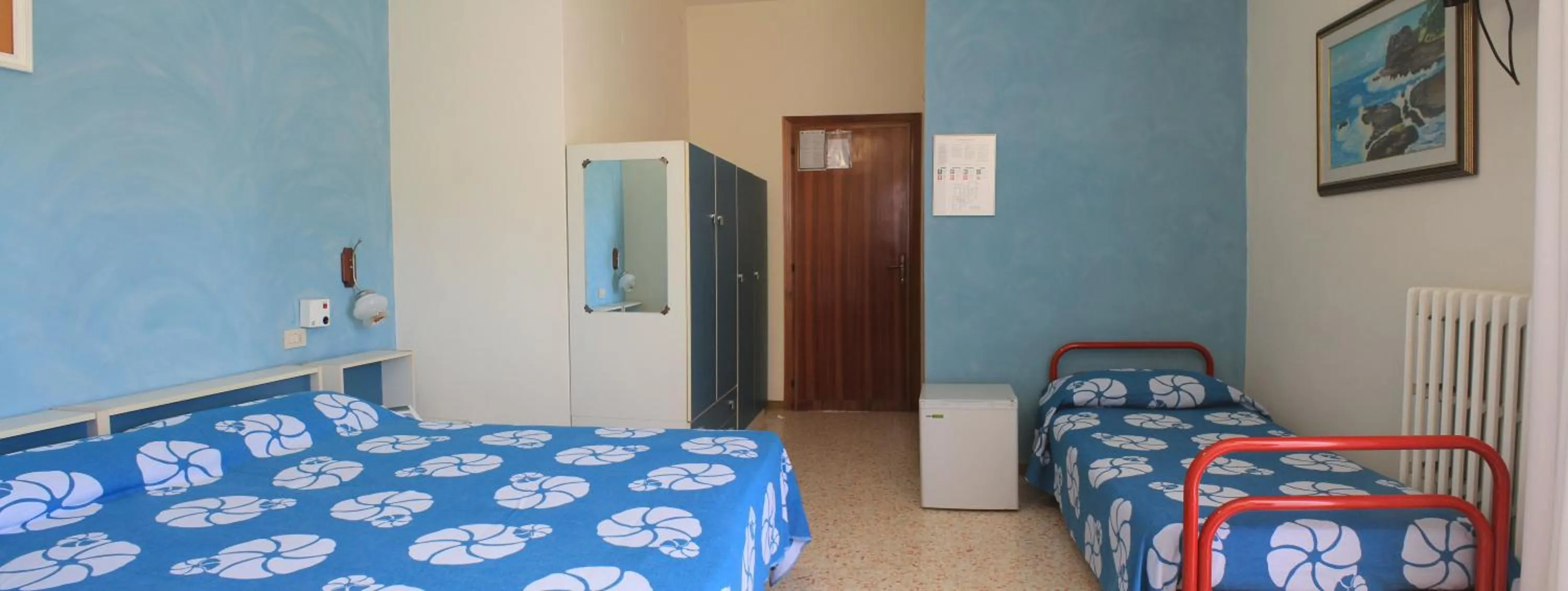 Bed in Hotel Saturno