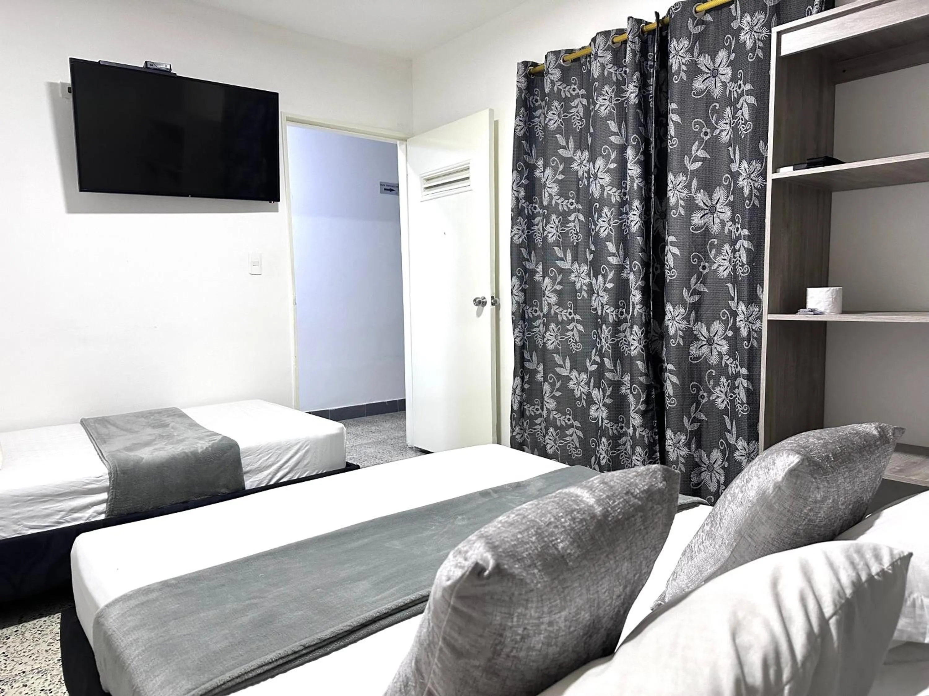 Communal lounge/ TV room, Bed in Hotel Guayacanes 70