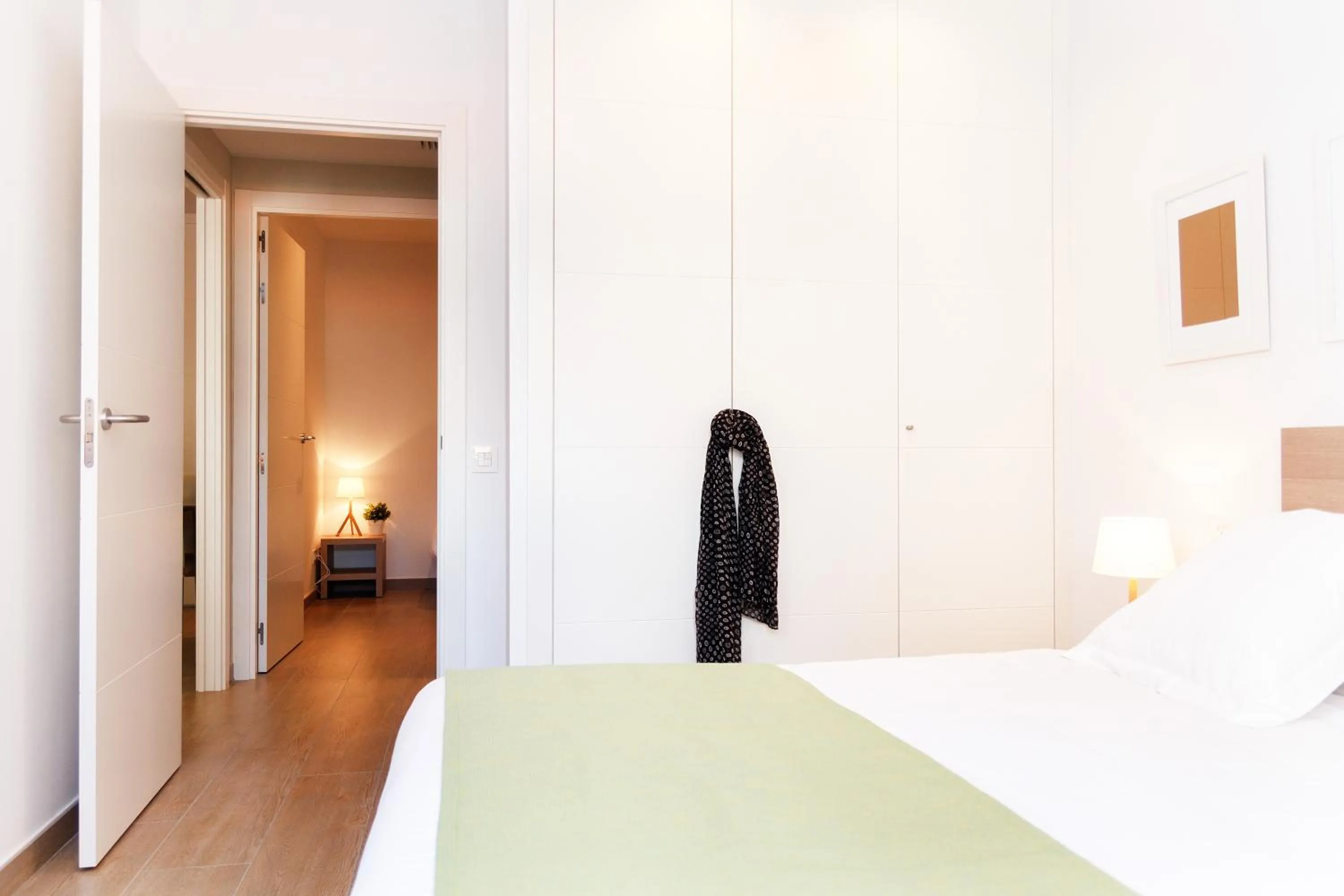 Bedroom, Bed in Feelathome Plaza Apartments