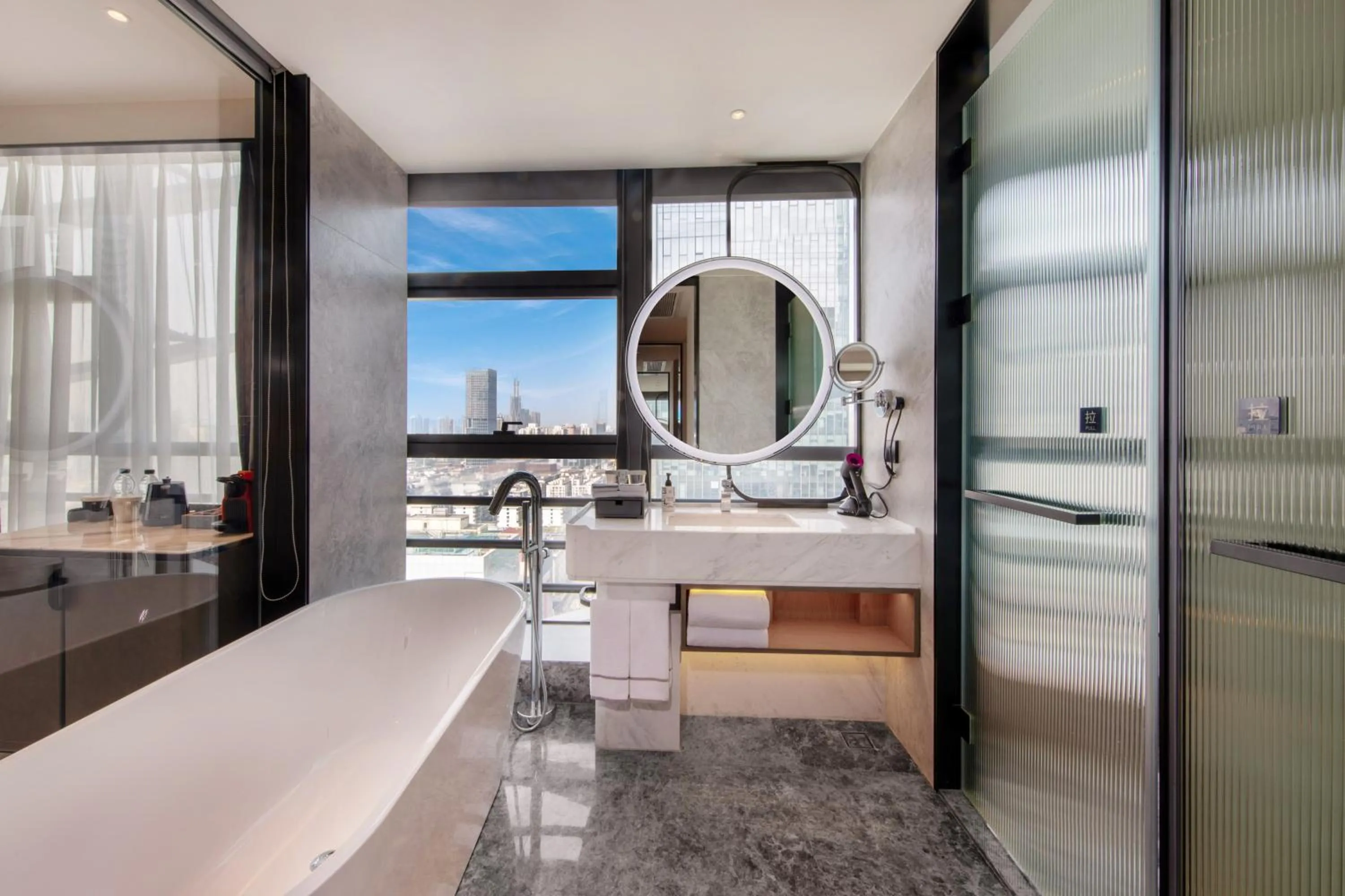 Bathroom in UrCove by HYATT Shenzhen Luohu