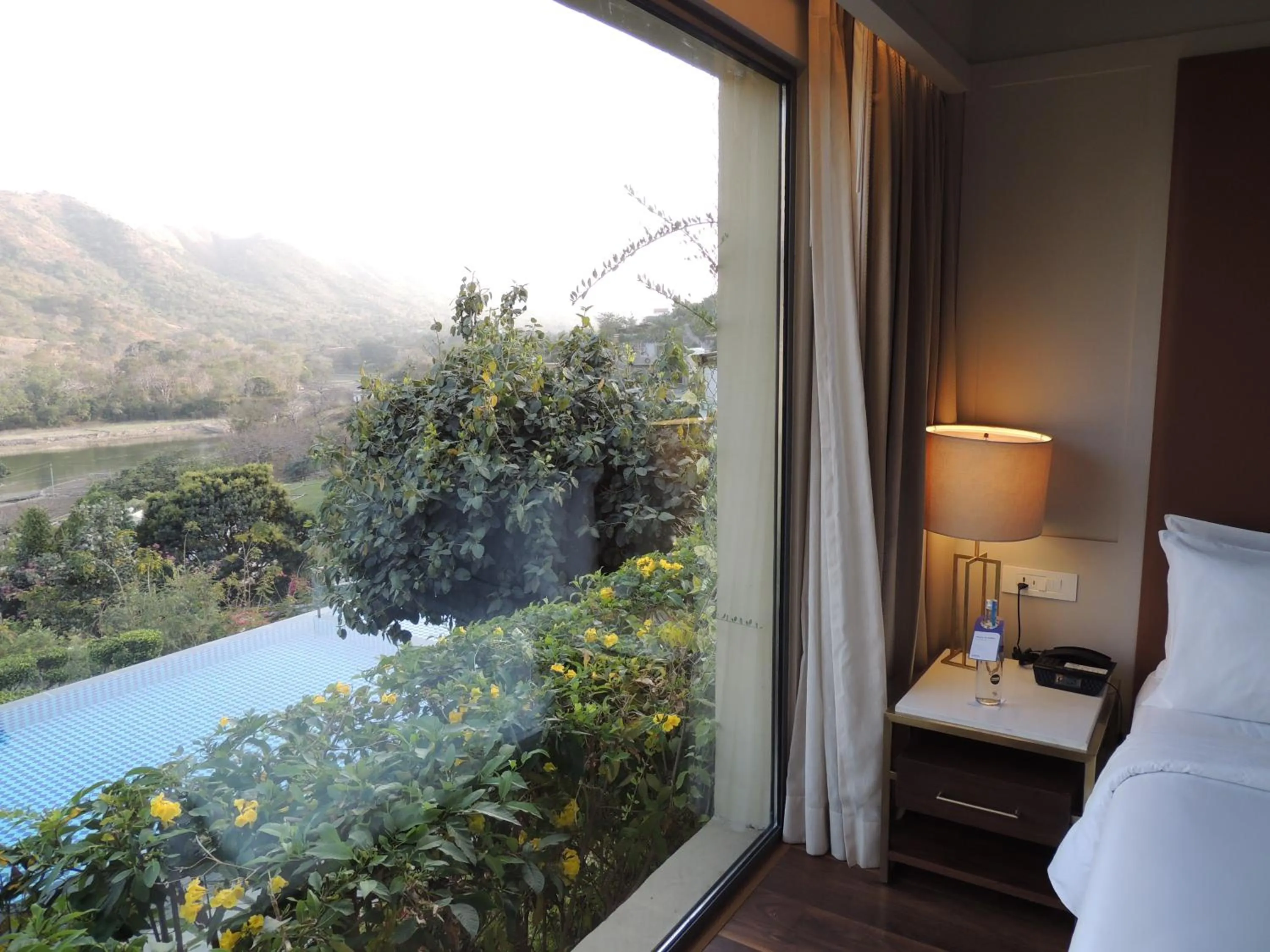 View (from property/room), Bed in Radisson Blu Resort Kumbhalgarh