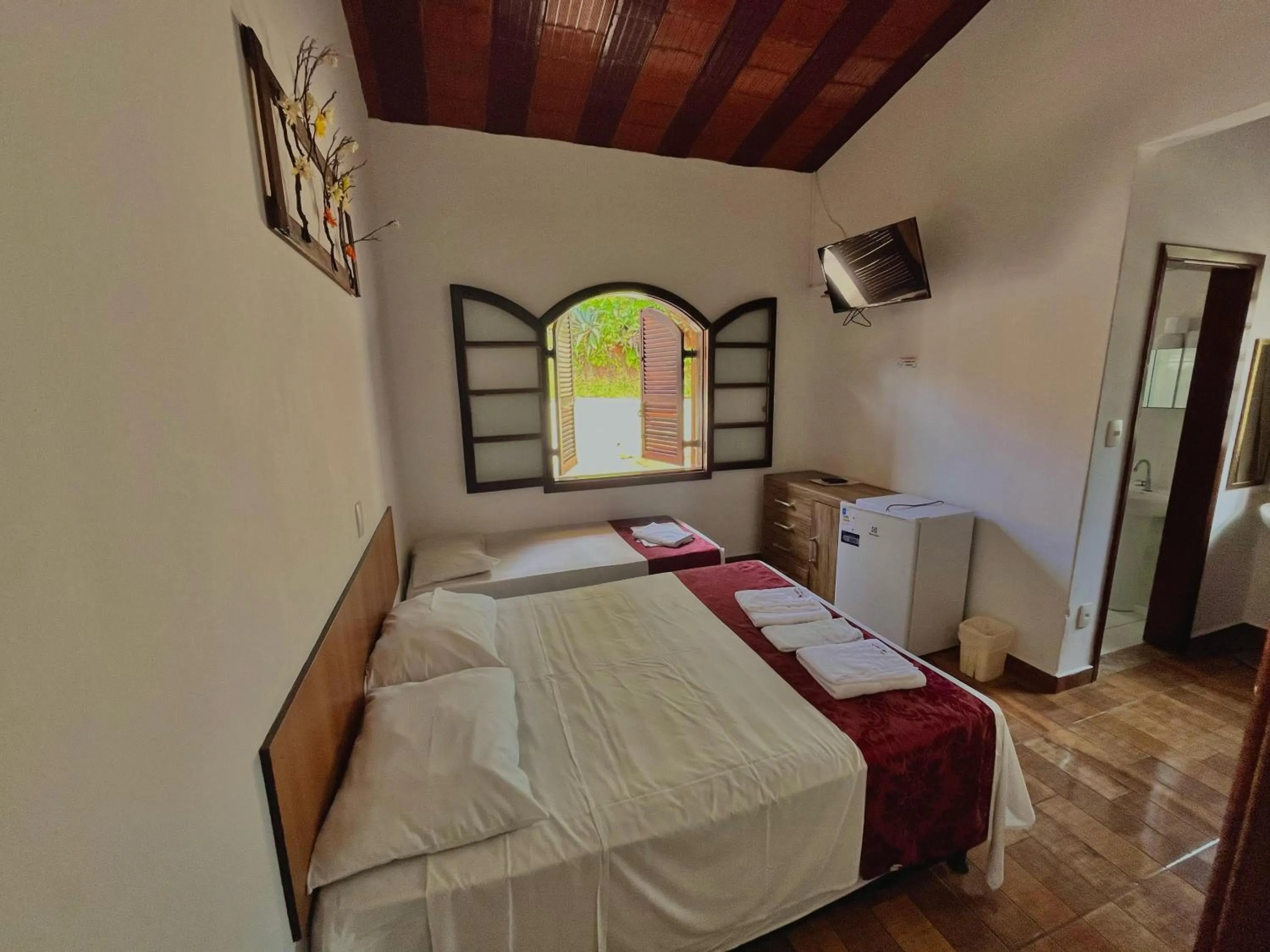 Bed in Pousada Pé da Serra