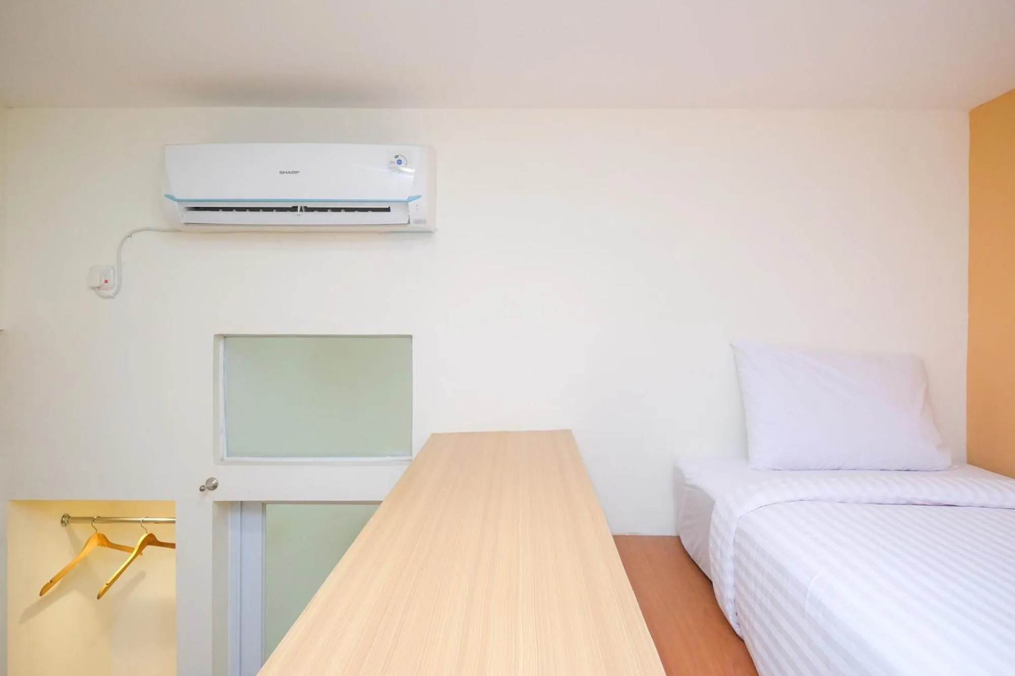 Bed in Sans Hotel Aurum Majapahit Semarang