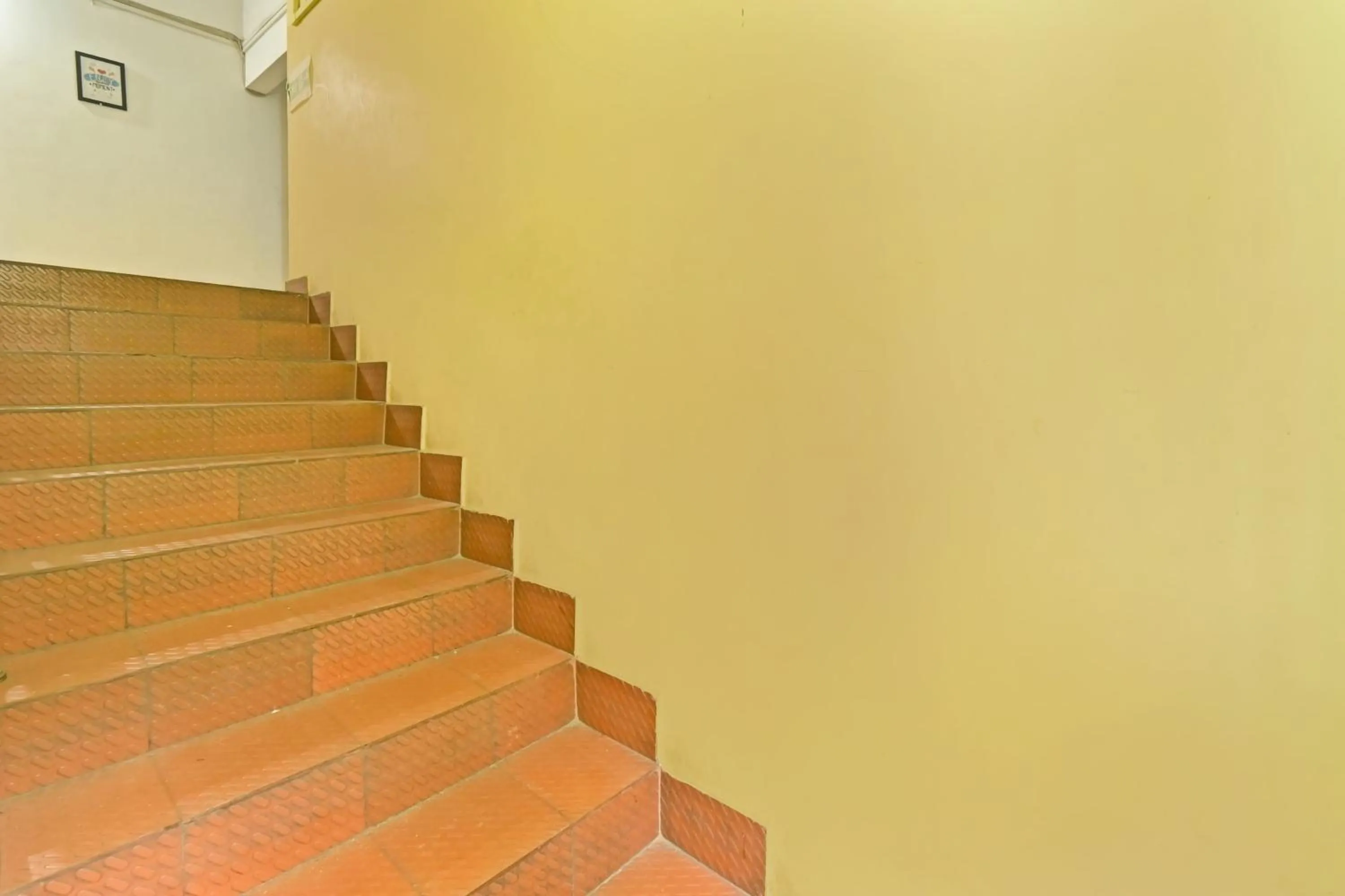 Bedroom in Hotel O Homely Residency
