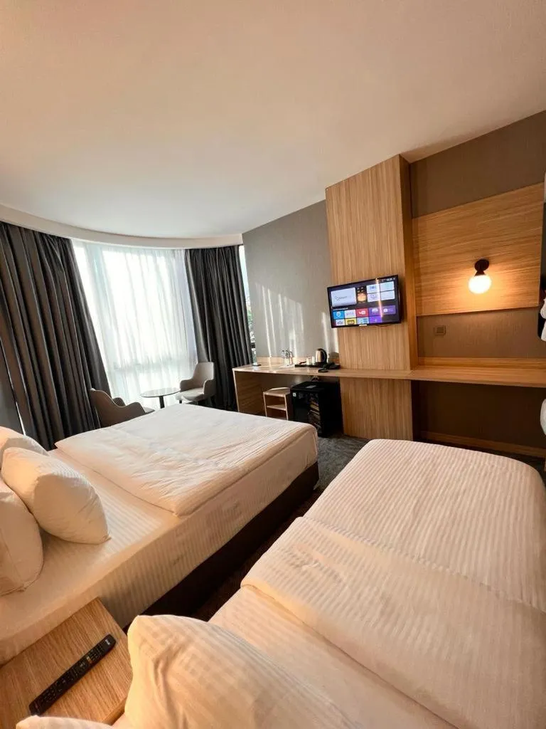 Bed in Royal Mass Airport Business Hotel