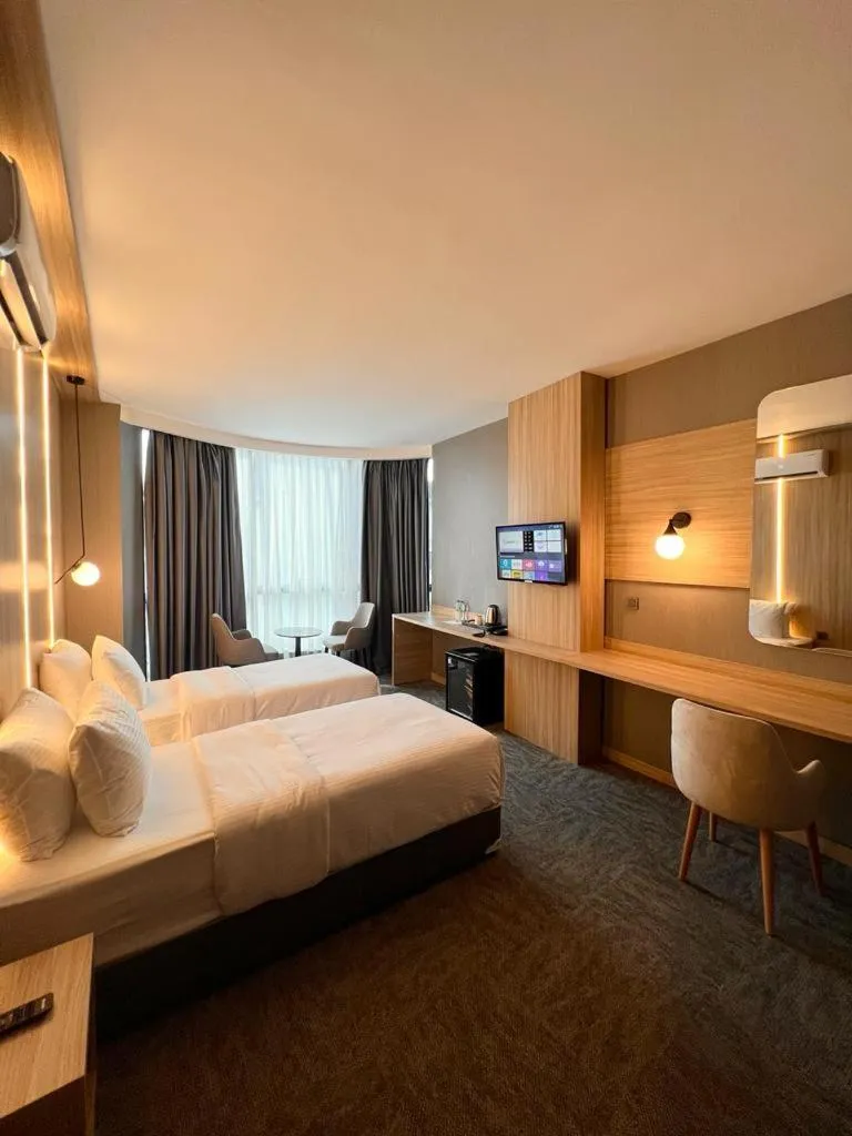 Bed in Royal Mass Airport Business Hotel