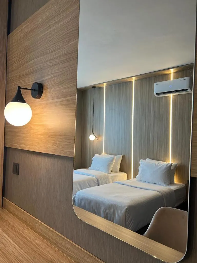 Bed in Royal Mass Airport Business Hotel