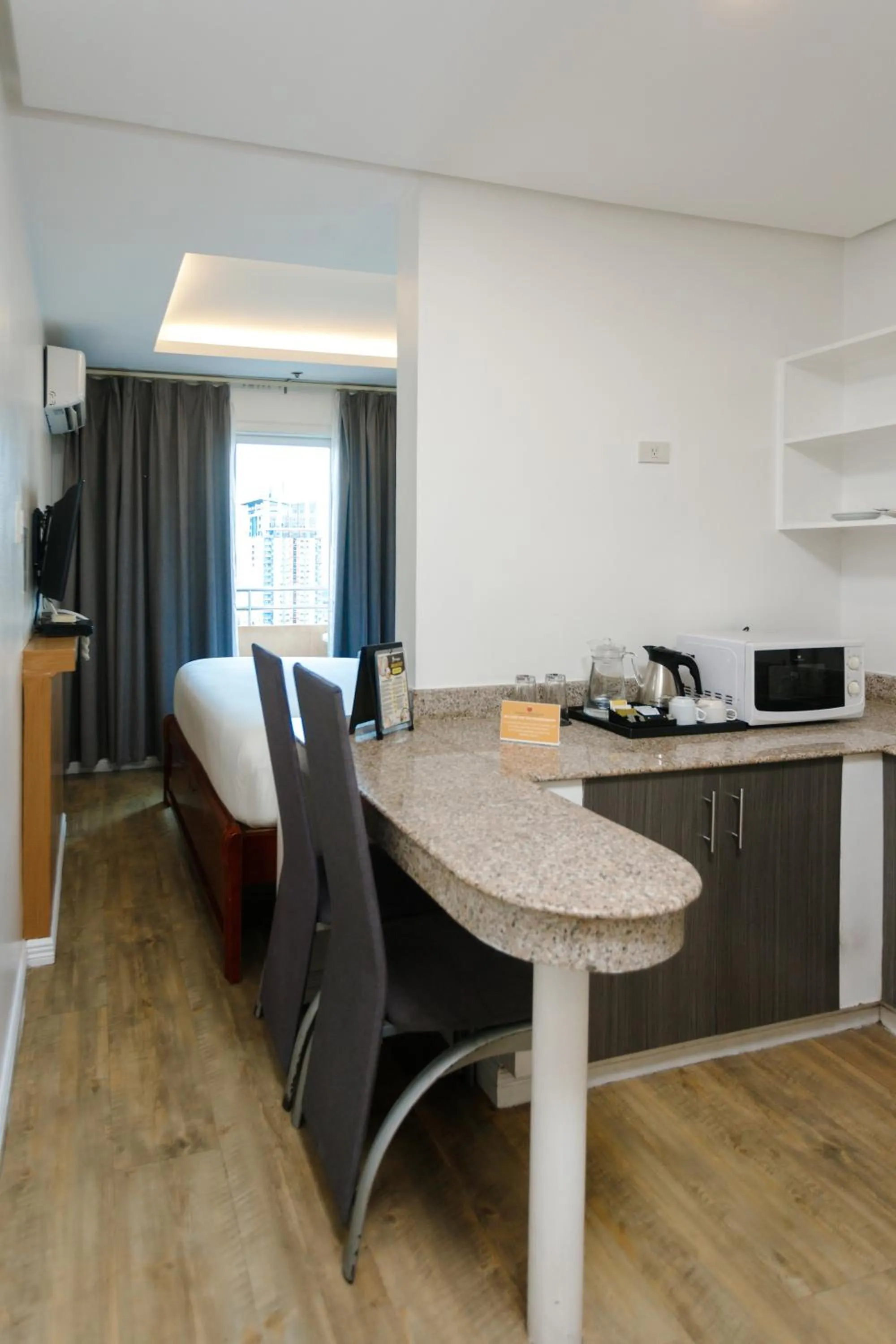Kitchen or kitchenette in Regency Grand Suites