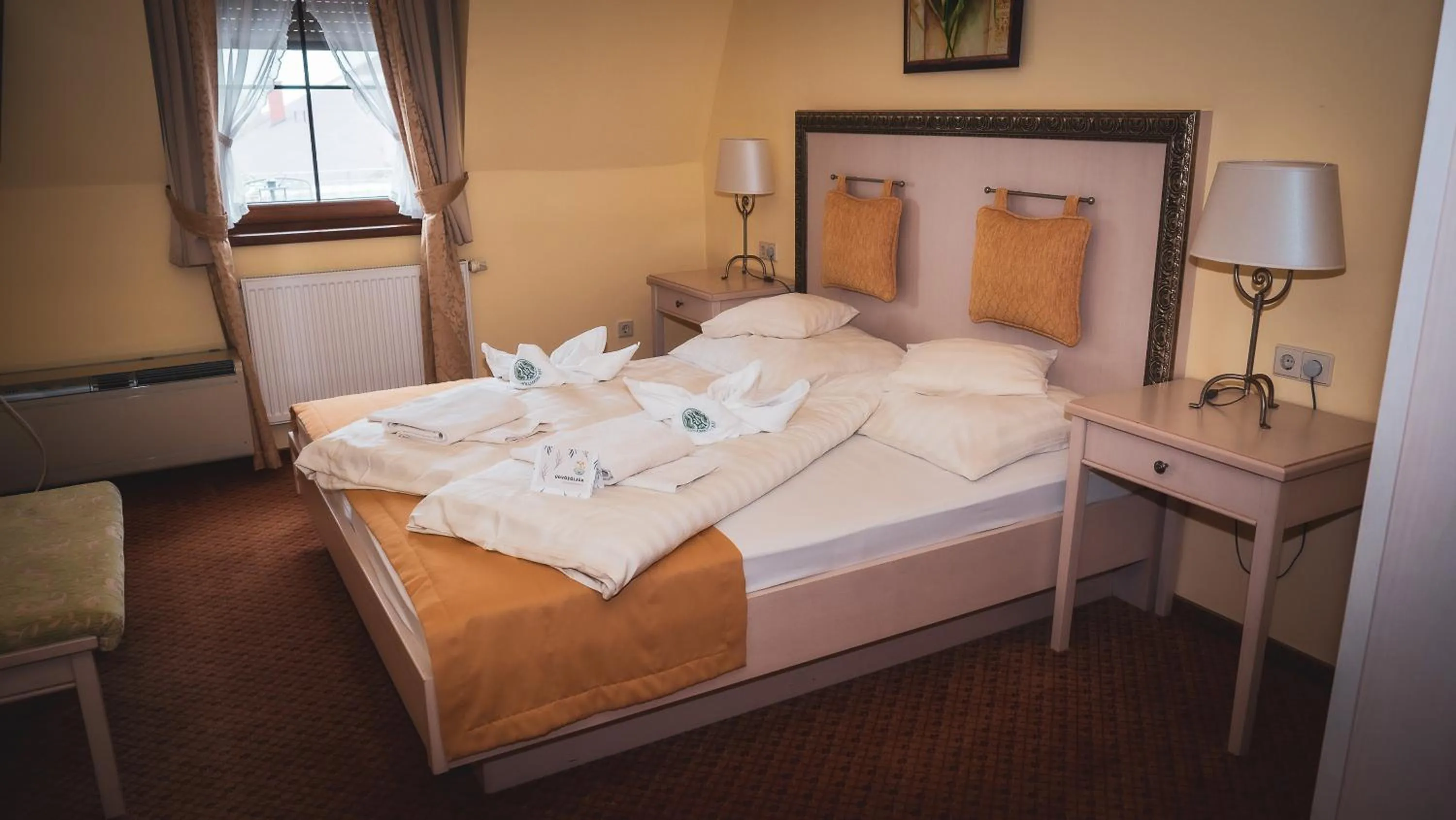 Bed in Hétkúti Wellness Hotel