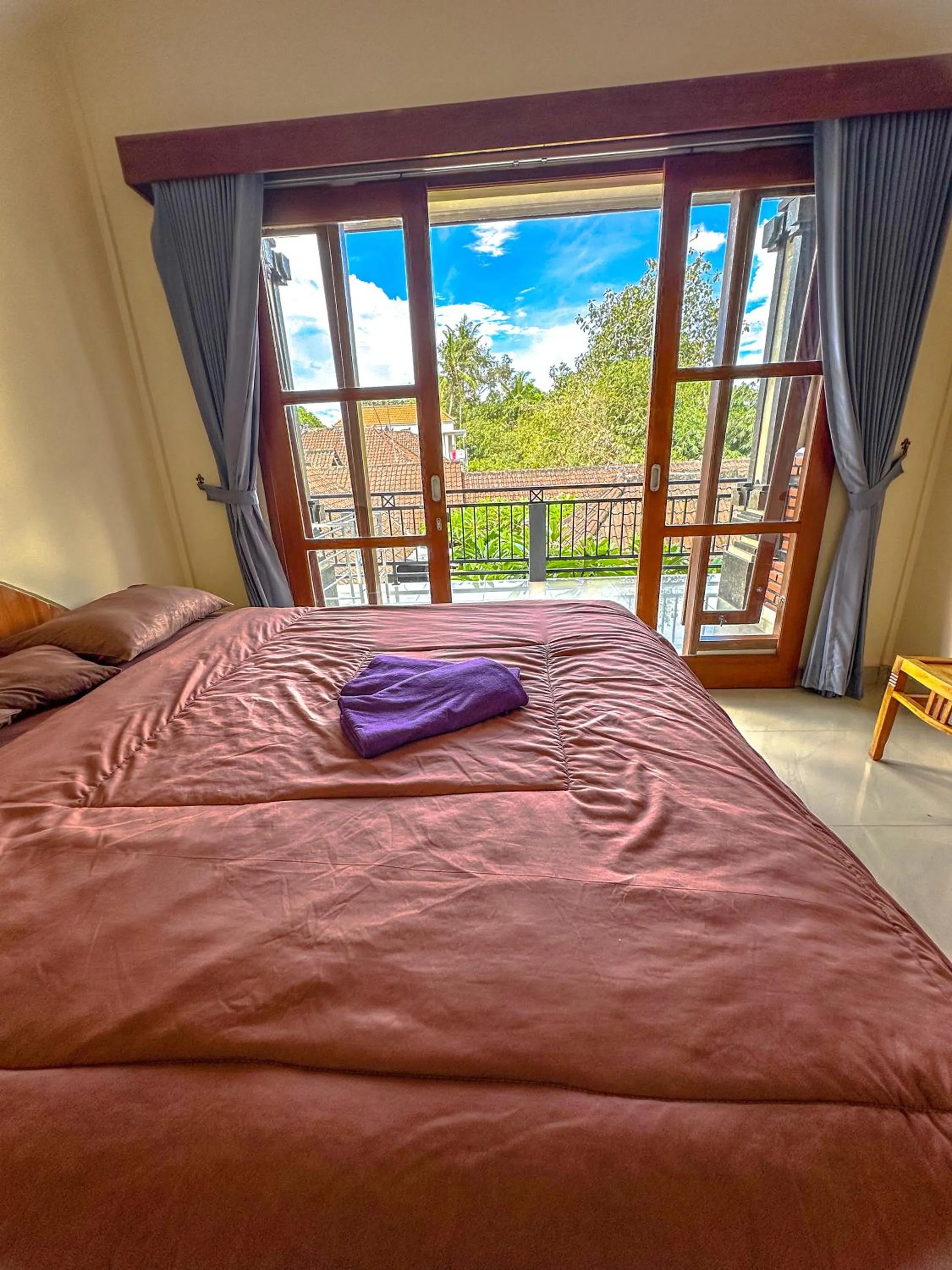 Bed in Ojek's Homestay