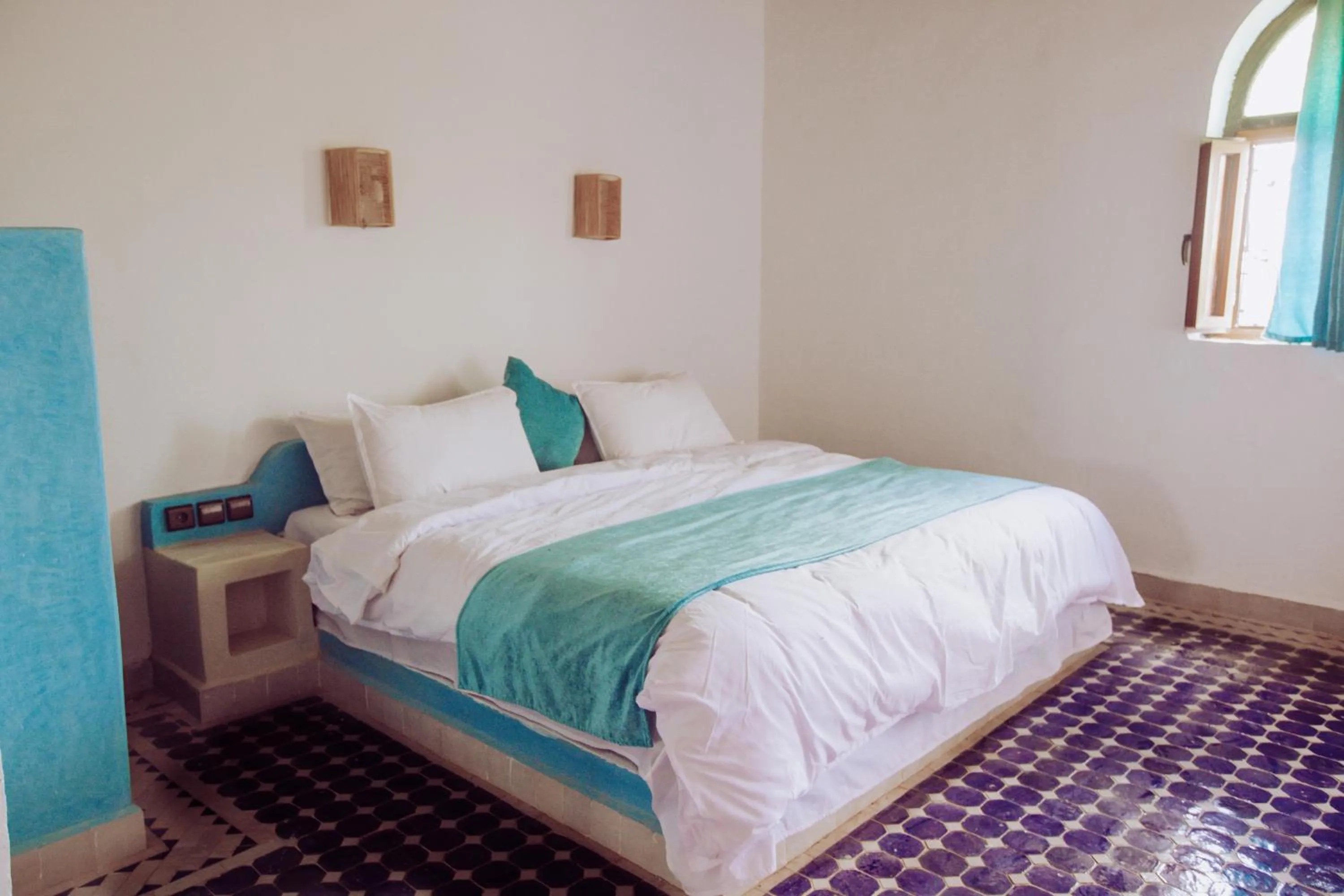 Bed in Riad Merzouga Dunes