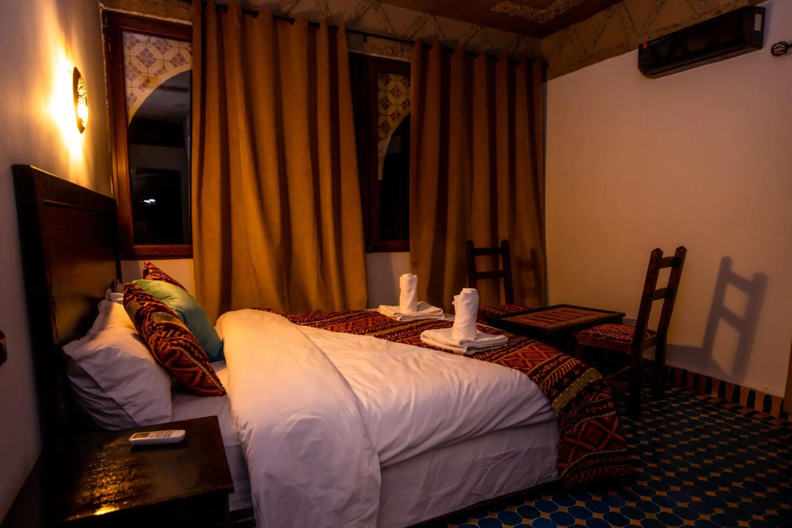 Bed in Riad Merzouga Dunes