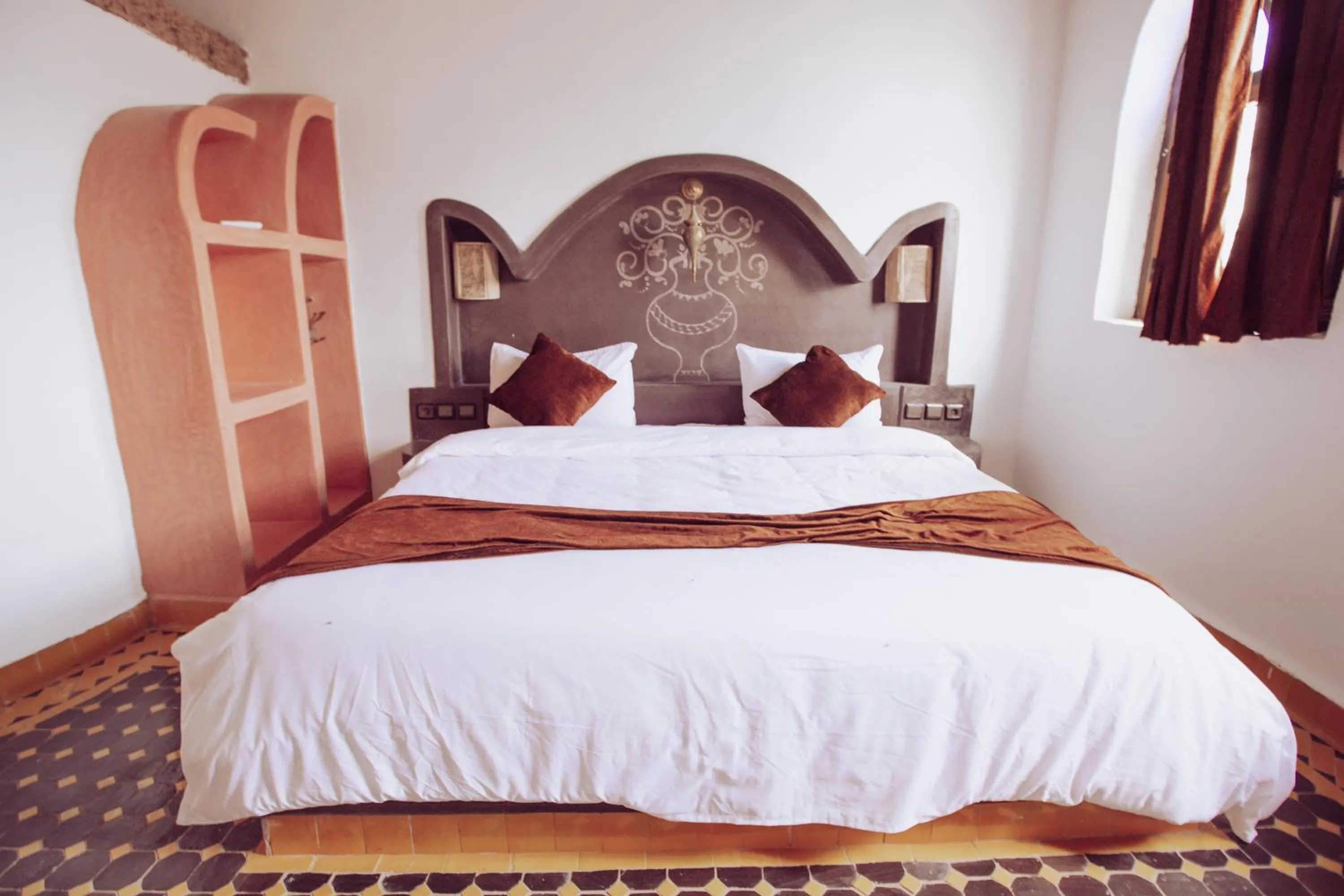 Bed in Riad Merzouga Dunes