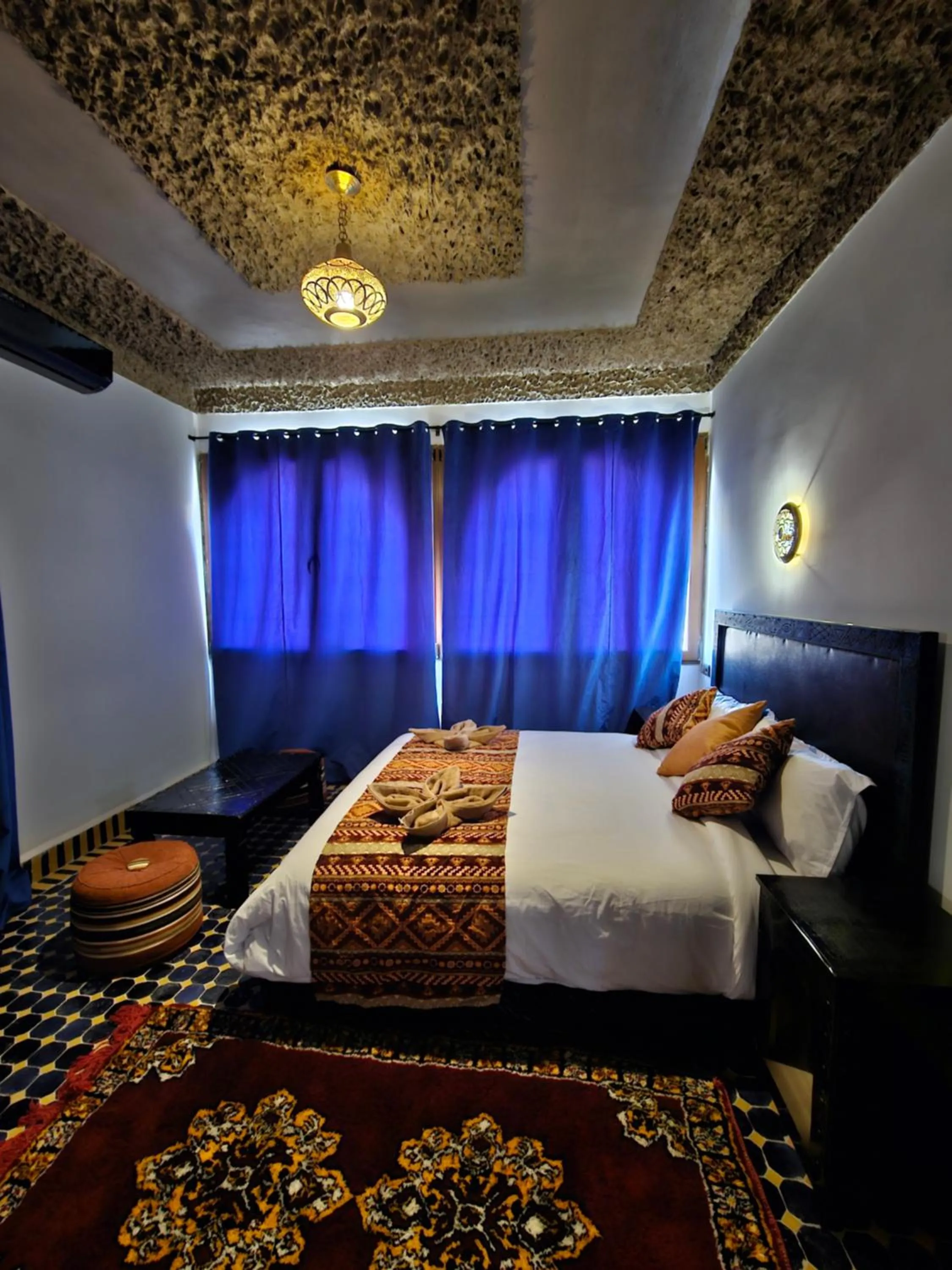 Bed in Riad Merzouga Dunes