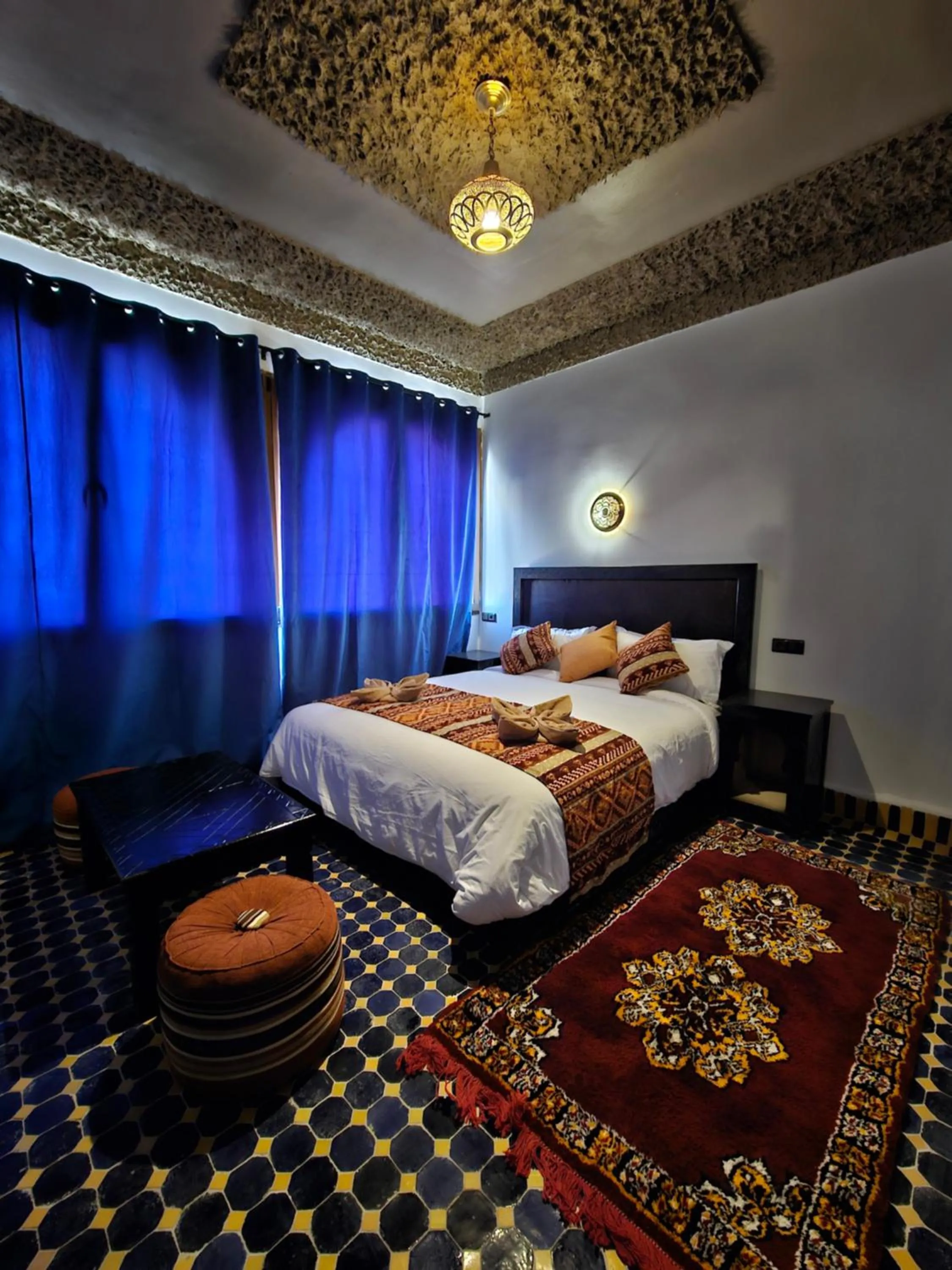 Bed in Riad Merzouga Dunes