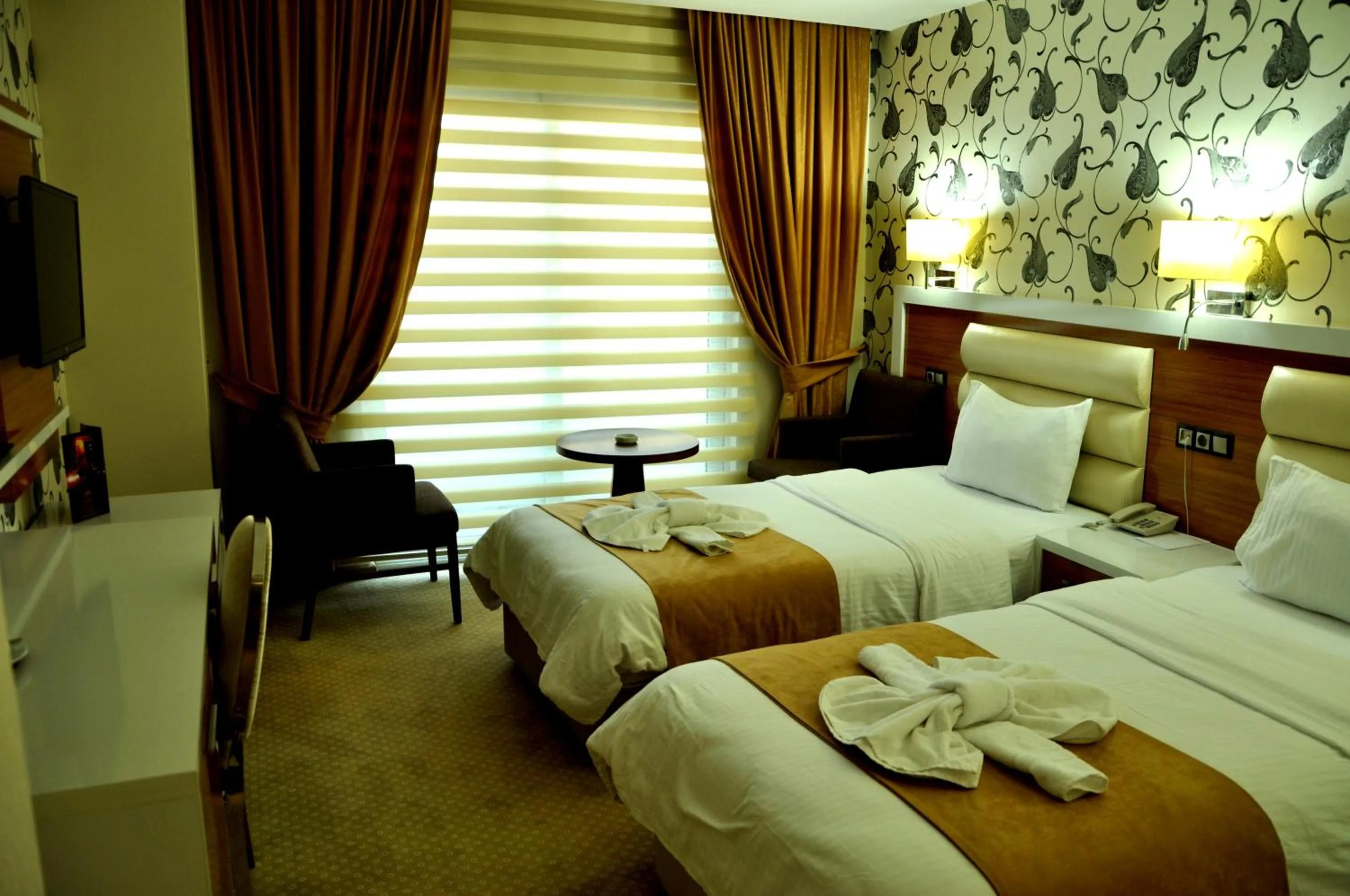 Photo of the whole room, Bed in The Ancient Mesopotamia Hotel