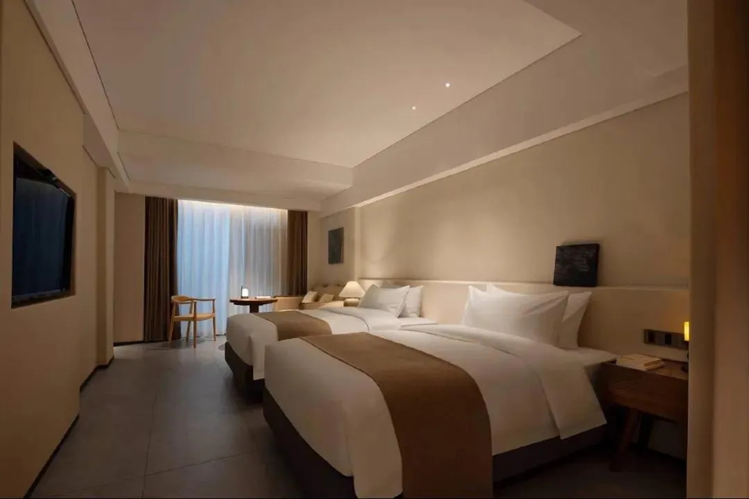 Bed in Phoenix Hall House Hotel