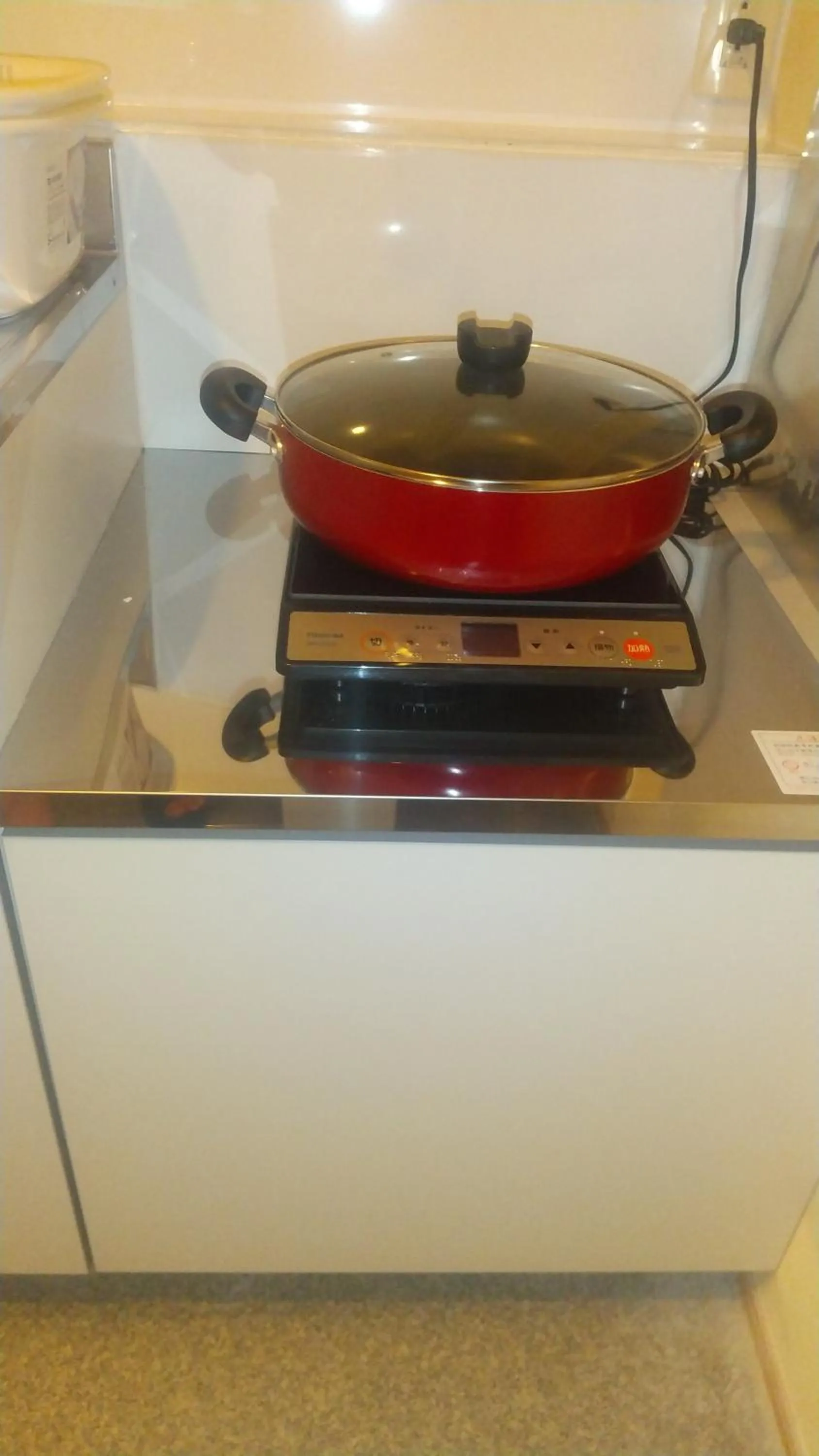 Kitchen or kitchenette in Hananosato Hotel 池袋本店