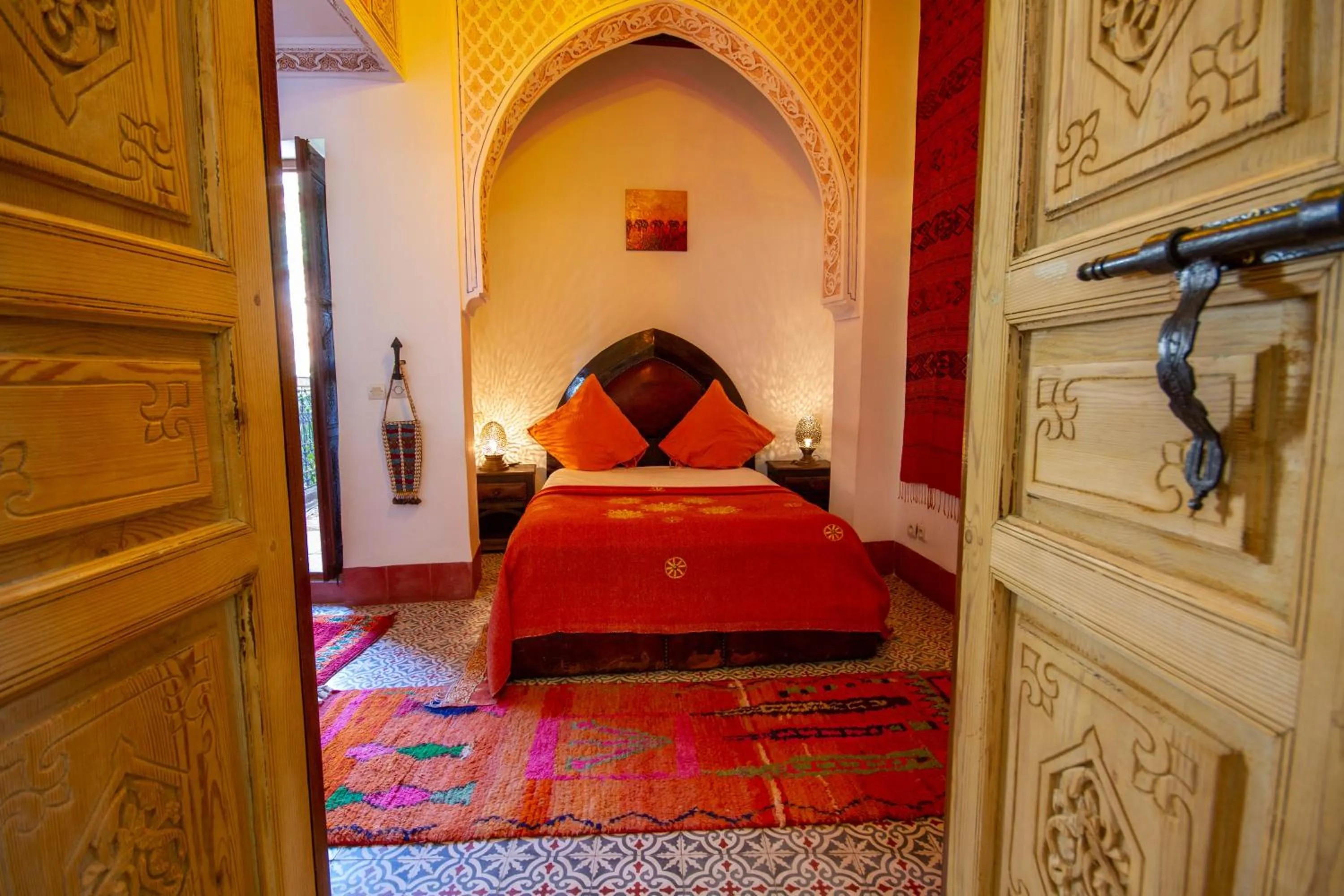 Bed in Riad Dombaraka