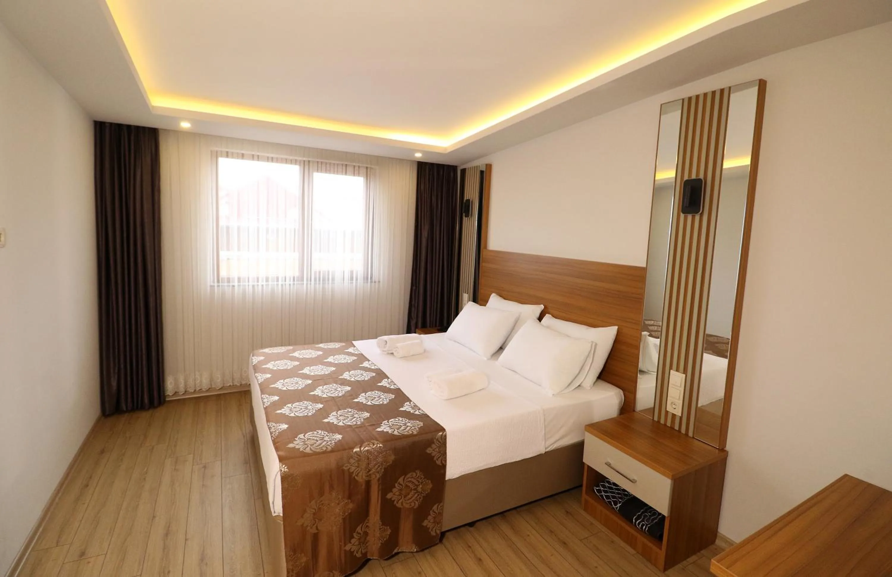 Bedroom in ALMIRCAN HOTEL