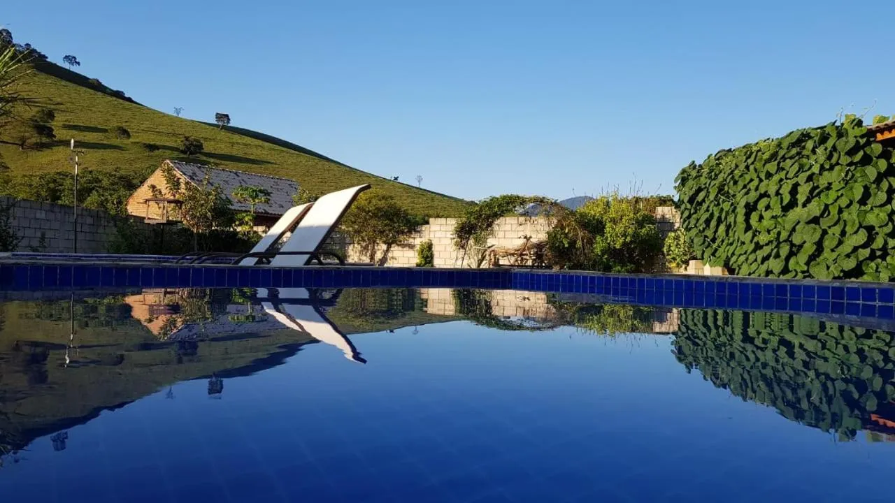 Swimming pool in Pousada Rota dos Pássaros