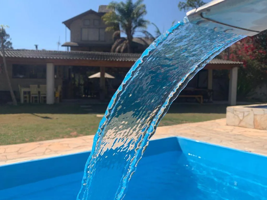 Swimming pool in Pousada Rota dos Pássaros