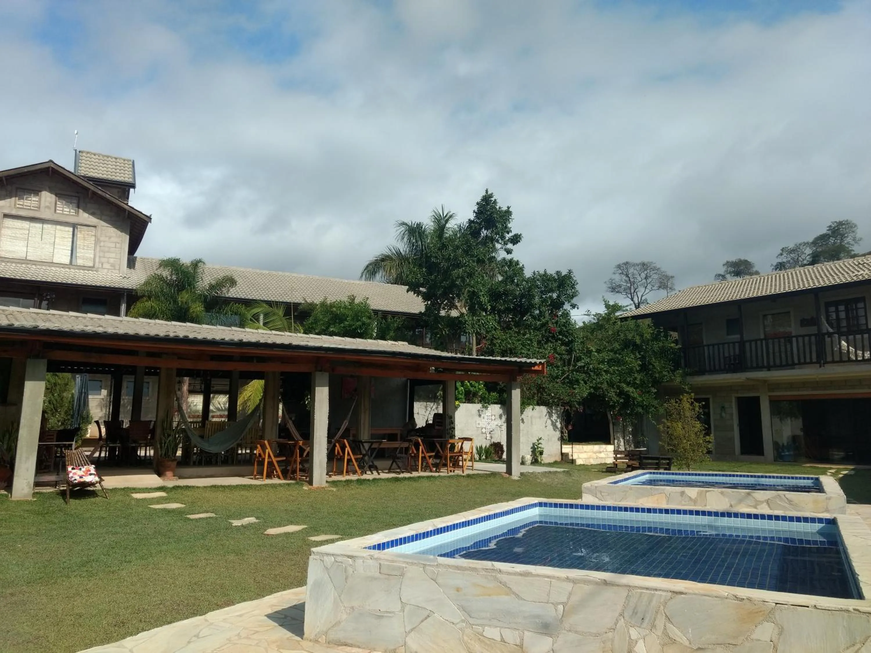 Swimming pool in Pousada Rota dos Pássaros