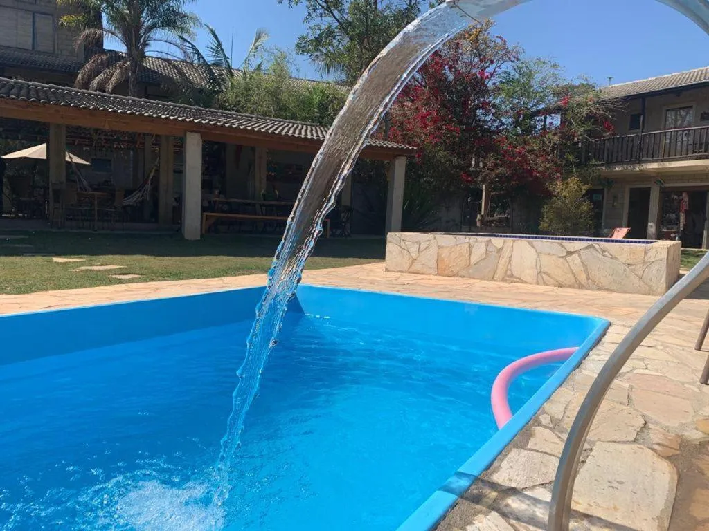 Swimming pool in Pousada Rota dos Pássaros