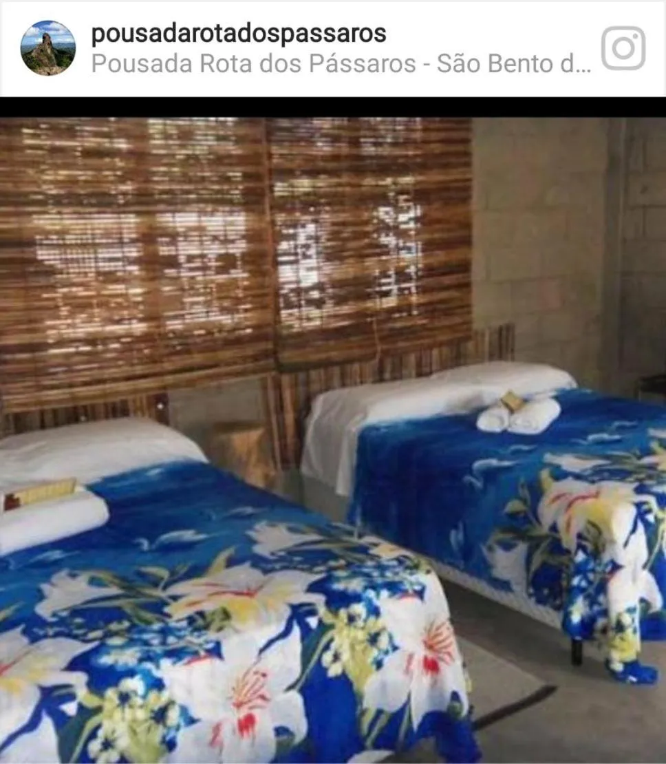 Bed in Pousada Rota dos Pássaros
