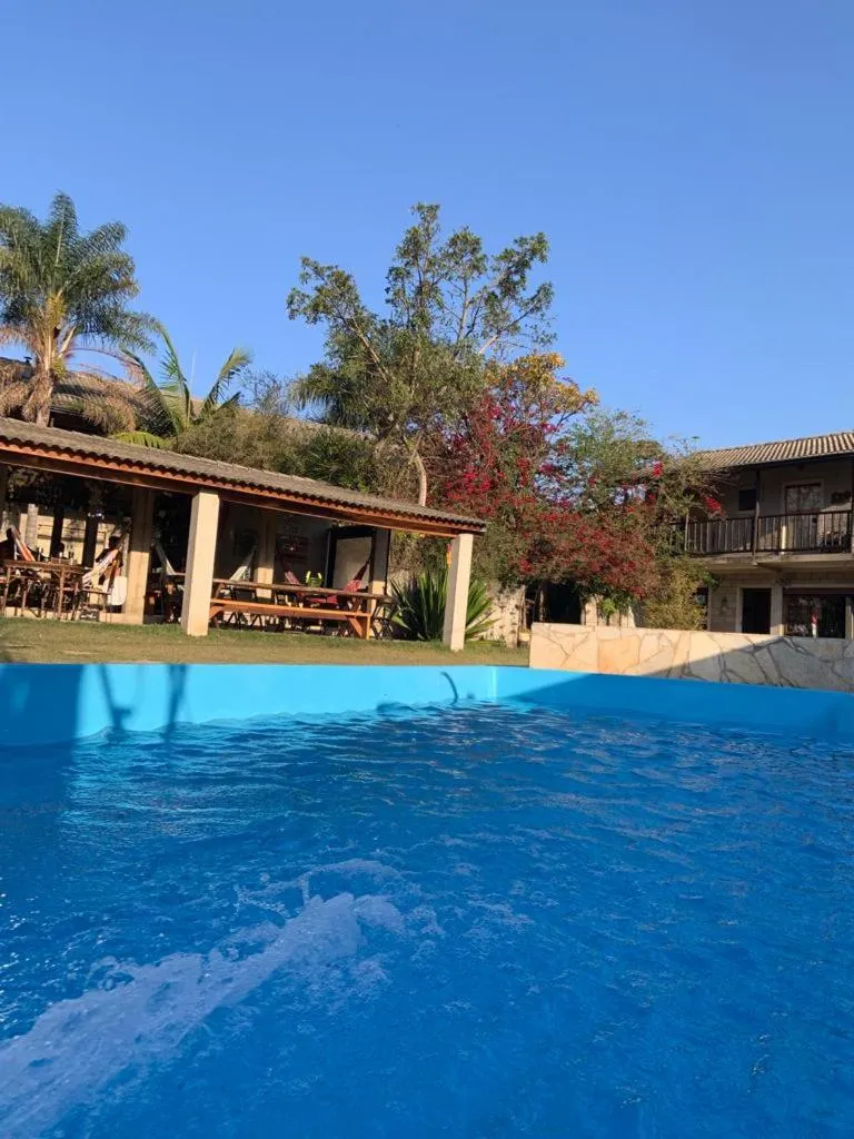 Swimming pool in Pousada Rota dos Pássaros