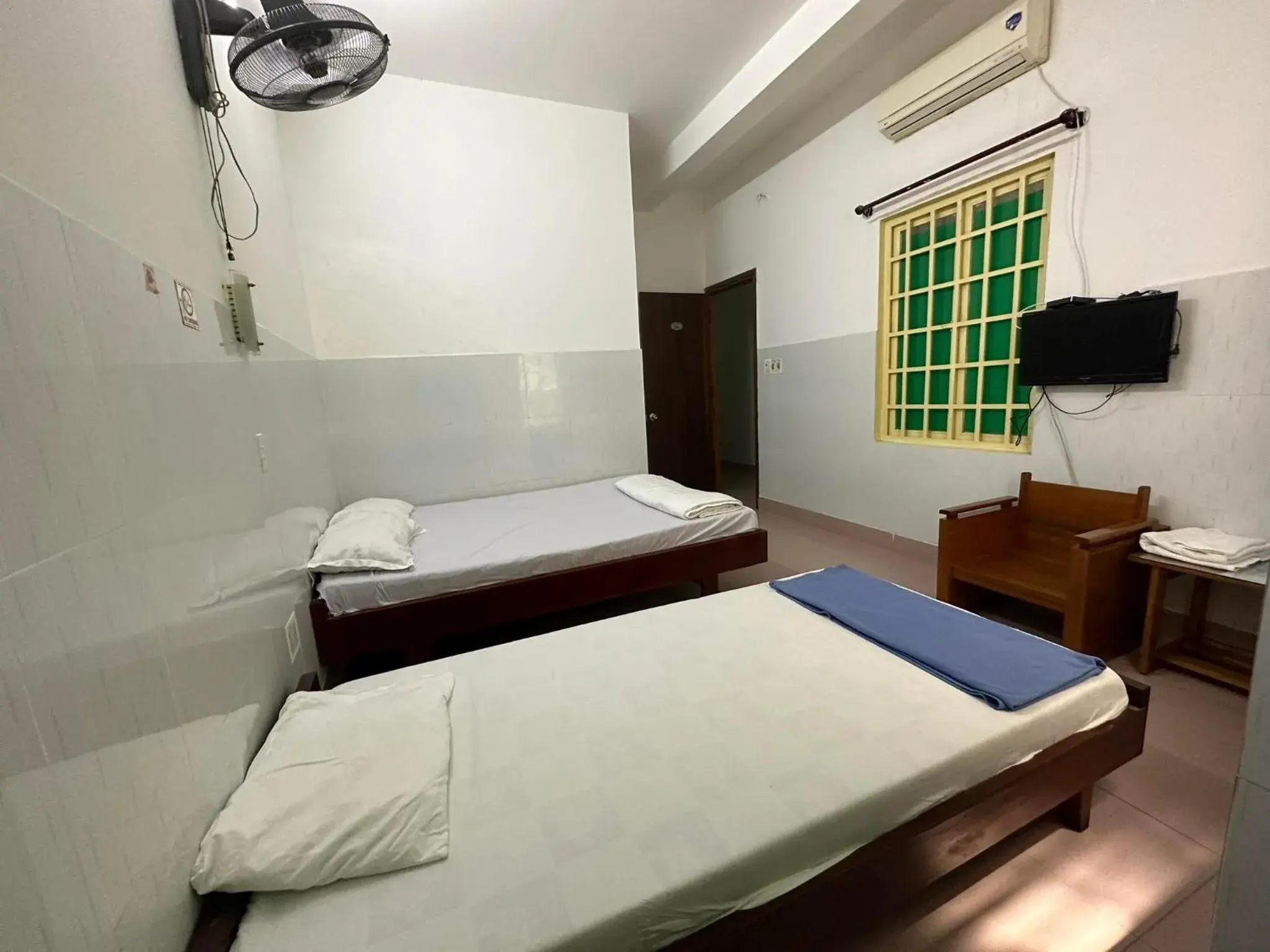 Superior Triple Room in OYO 1182 An Binh Motel Superior Triple Room in OYO 1182 An Binh Motel