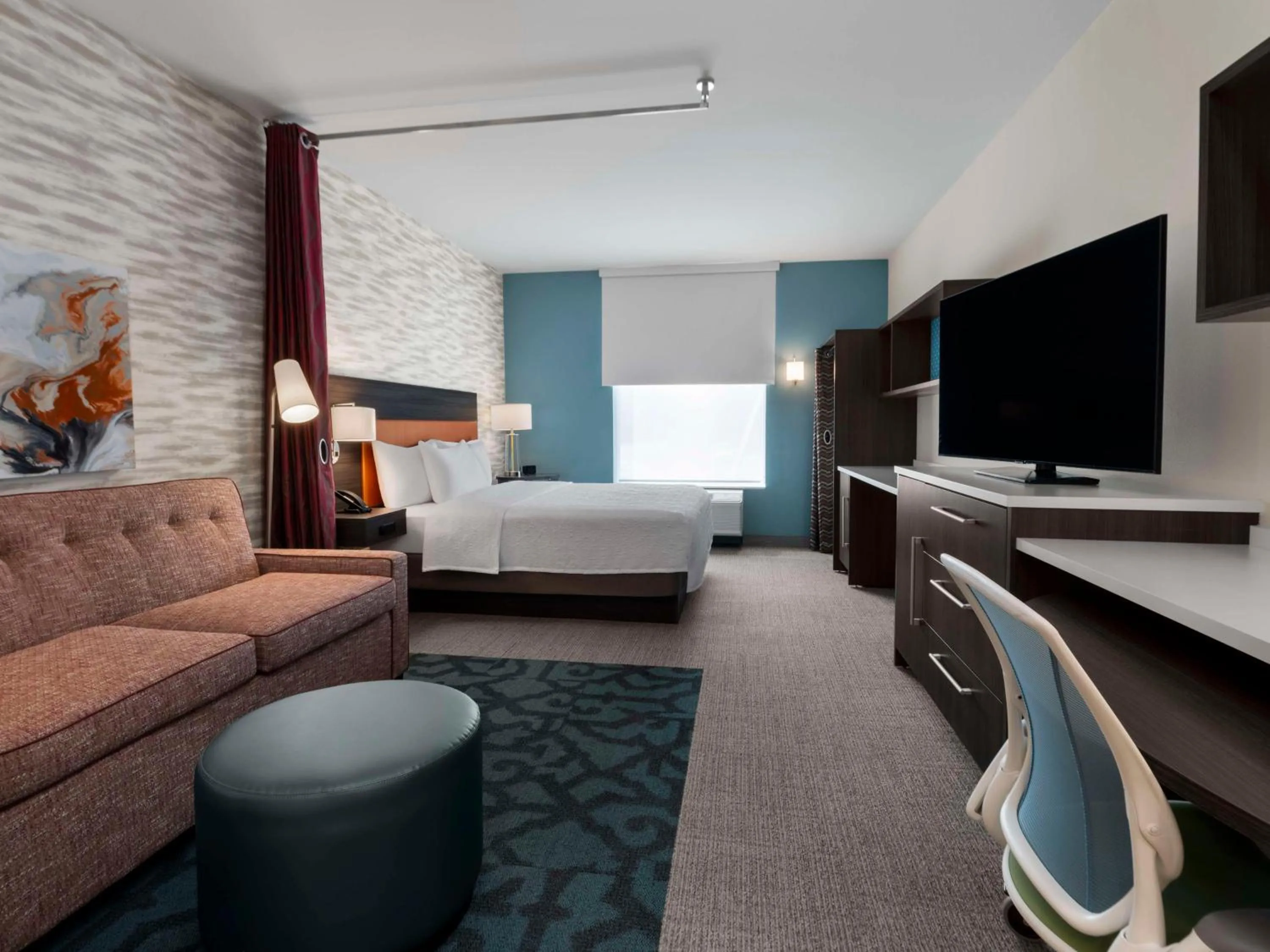 Living room, Bed in Home2 Suites by Hilton Orlando South Davenport